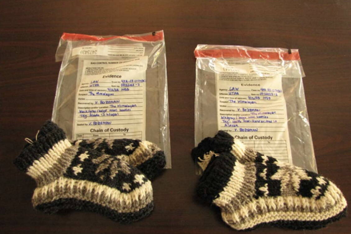 This screenshot from a court filing by the Alaska Department of Law shows two identical pairs of wool booties taken from a tourist shop near Denali National Park. One pair bears the label “made in Nepal,” while the other says that it was made in Alaska. (Screenshot)