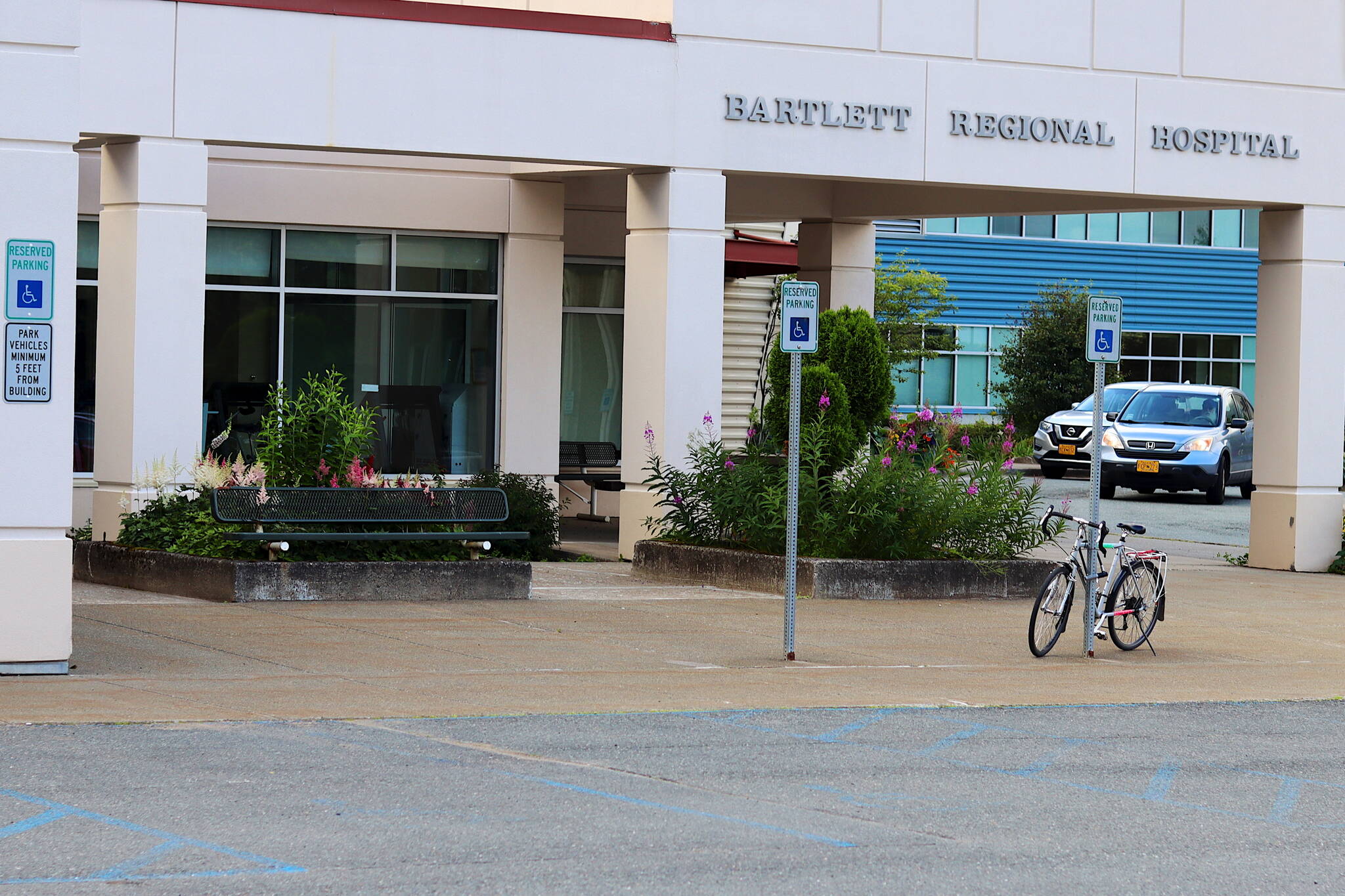 A bike is parked outside the main entrance of Bartlett Regional Hospital on Thursday. (Mark Sabbatini / Juneau Empire)