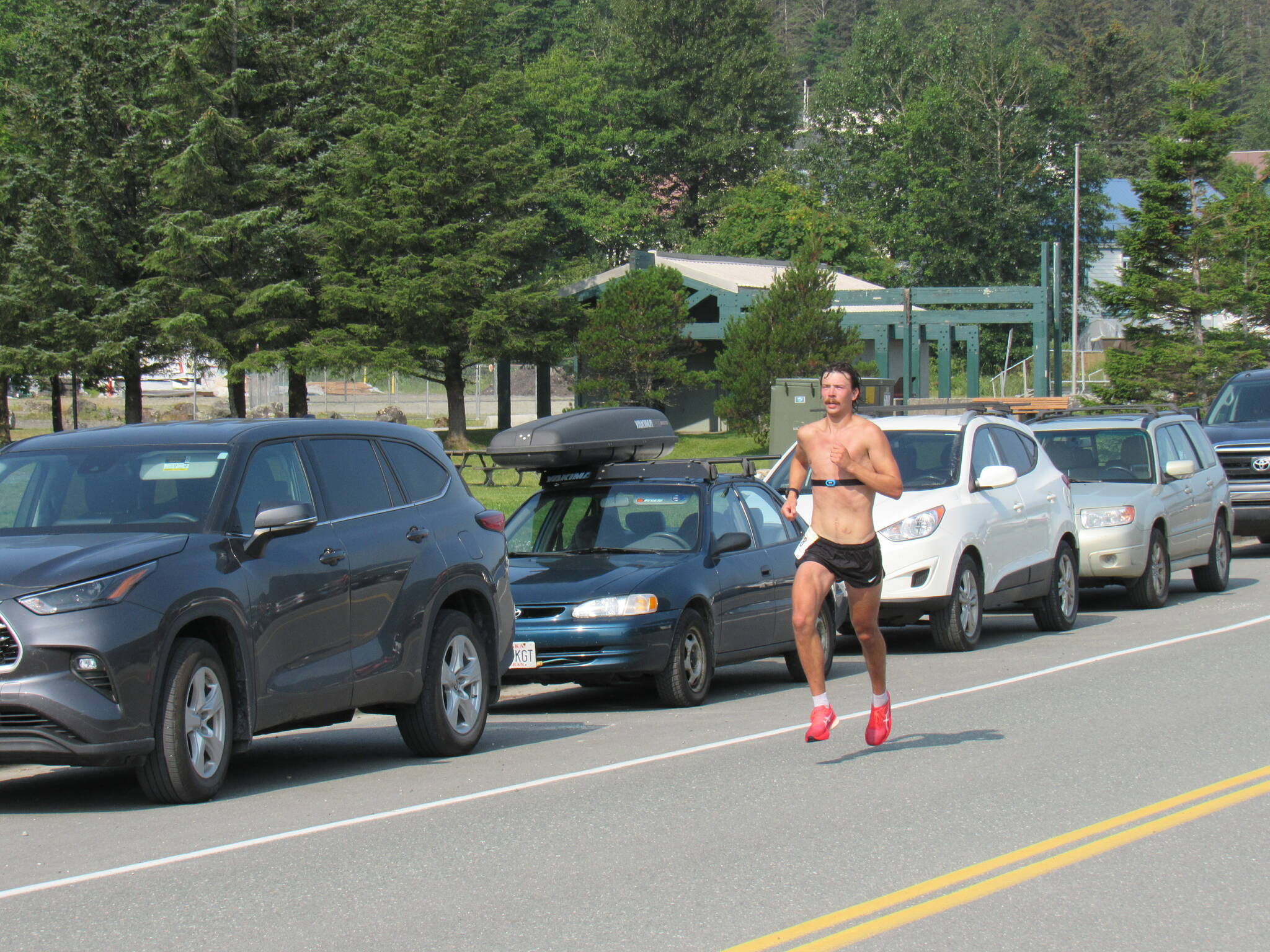Zack Bursell of Juneau nears the finish line of the Juneau Half Marathon on Saturday at Savikko Park. He finished second in the race with a time of 1 hour, 15 minutes, 46 seconds. (Photo courtesy of Juneau Trail and Road Runners)