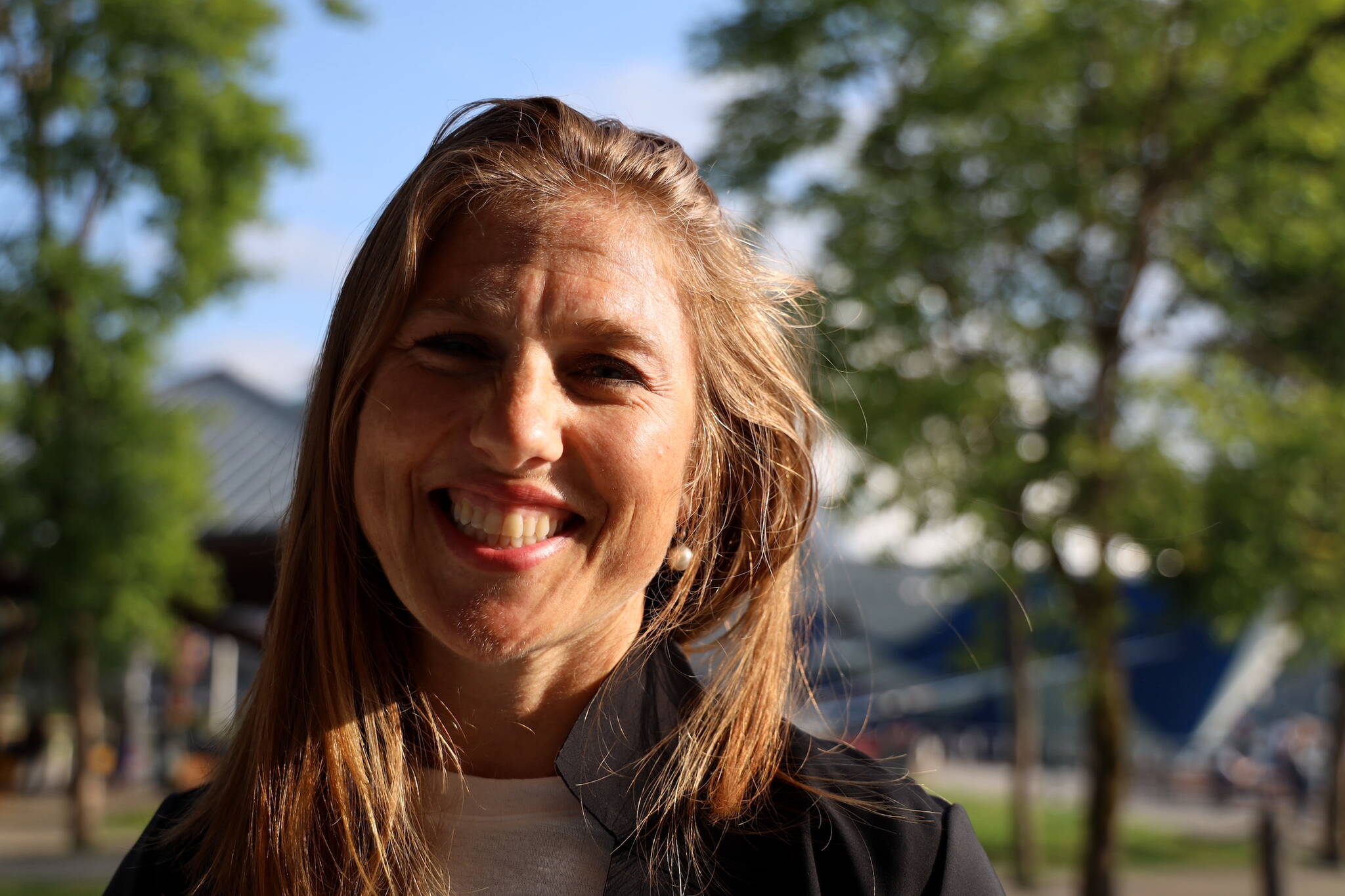 City Public Works and Engineering Director Katie Koester smiles for a photo downtown Wednesday evening. Koester was selected by the Assembly to serve as the next city manager following the retirement of Rorie Watt in September. (Clarise Larson / Juneau Empire)