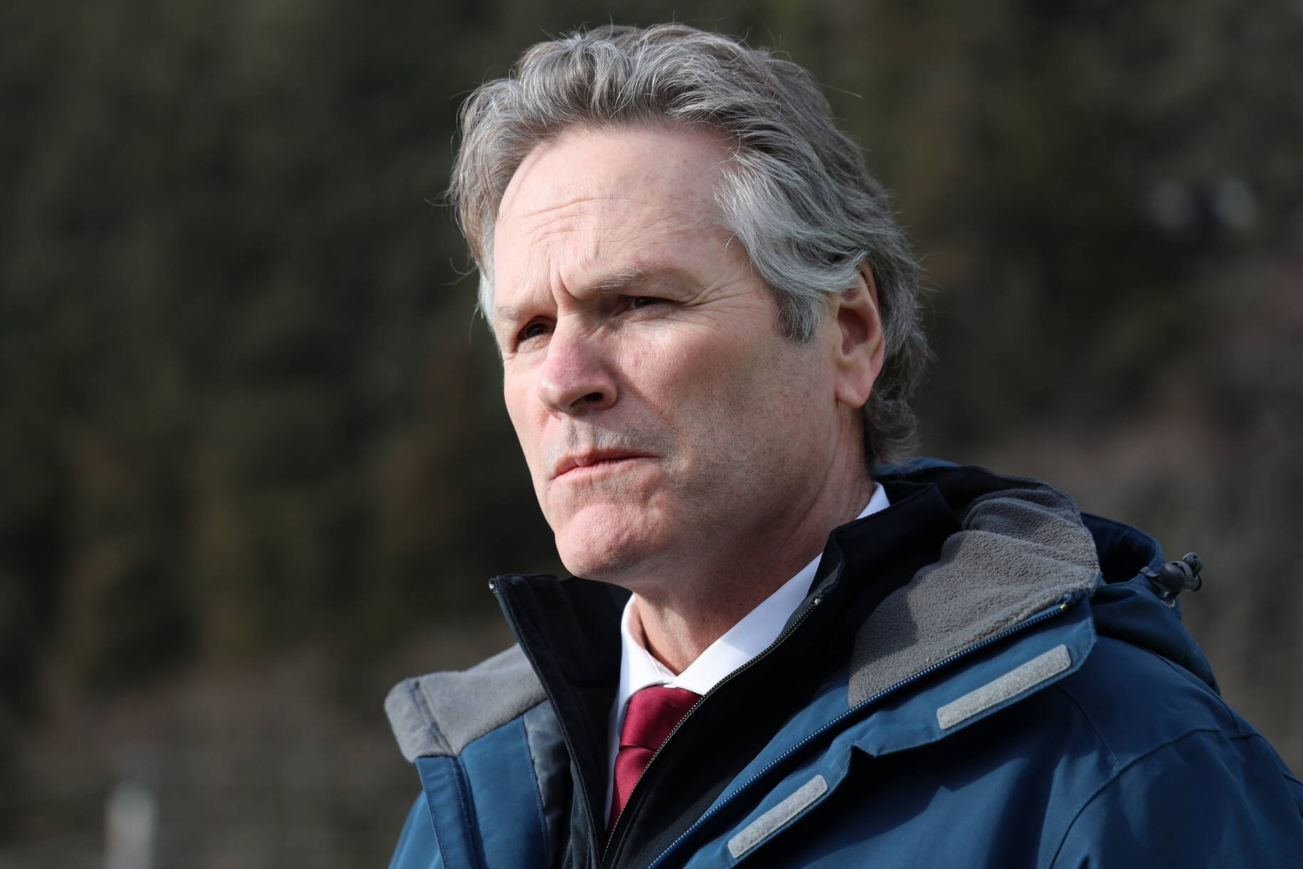 Gov. Mike Dunleavy, seen here at an event at the Auke Bay Ferry Terminal in March, on Tuesday issued a state disaster declaration for the Suicide Basin flood that occurred during the weekend. (Clarise Larson / Juneau Empire File)
