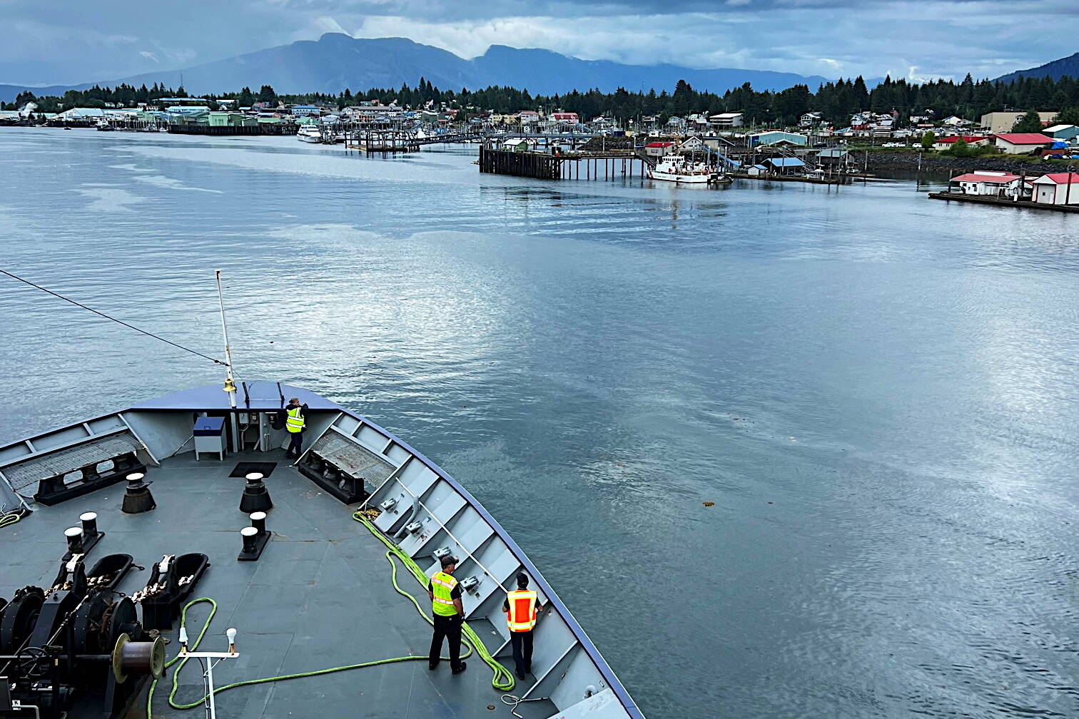 Meredith Jordan / Juneau Empire
Members of the deck department of the Columbia state ferry get ready to dock the vessel in Petersburg on July 17. A change in the accounting department is expected to lessen the number of payroll complaints among Alaska Marine Highway System employees.