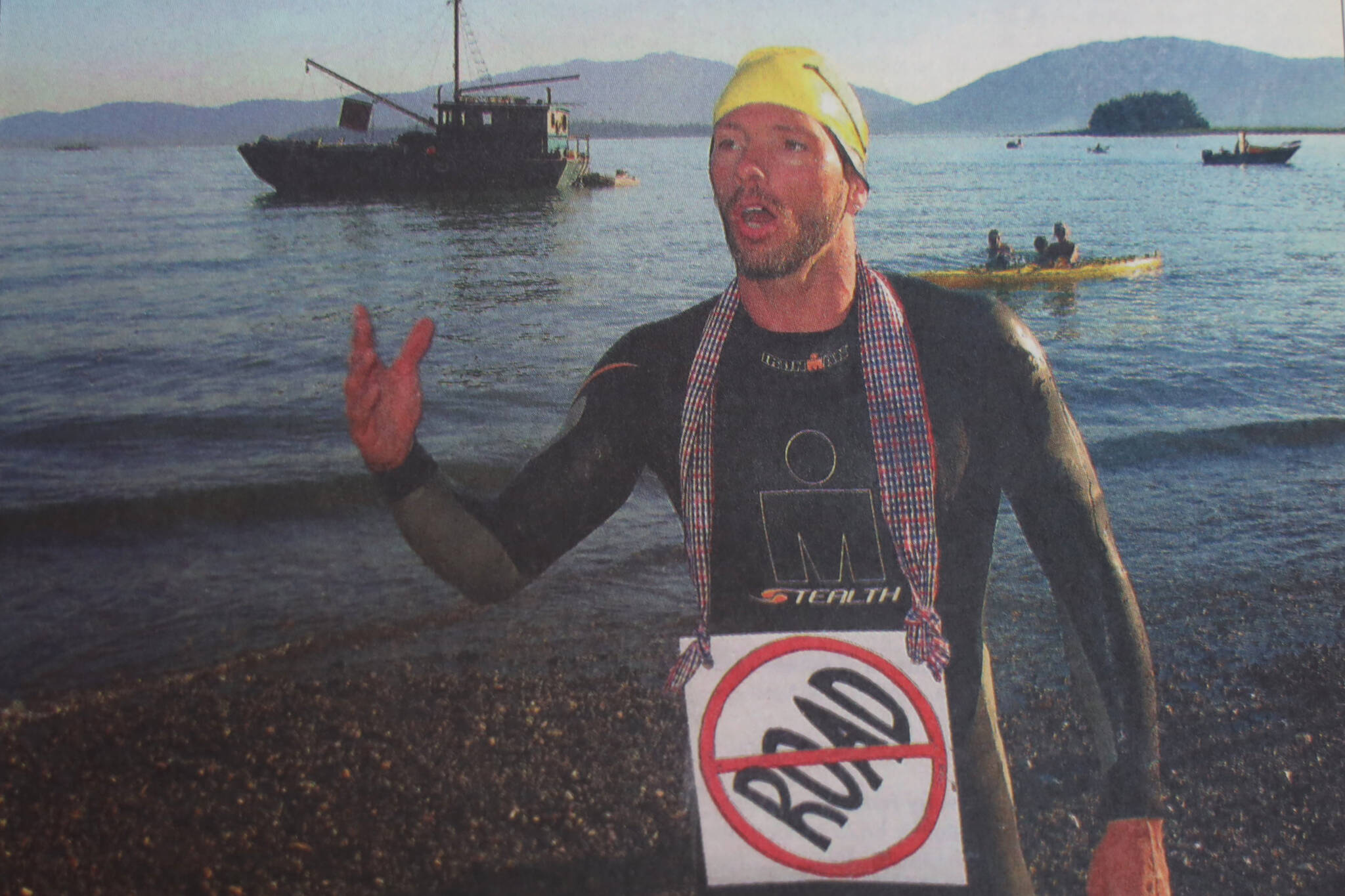 Steve Vick delivers a speech at Auke Village Recreation Area after completing his nine-day, 92-mile swim from Skagway on Wednesday, Aug. 10, 2005. Vick swam to call attention to the proposed Juneau to Skagway road. (Brian Wallace / Juneau Empire Archives)