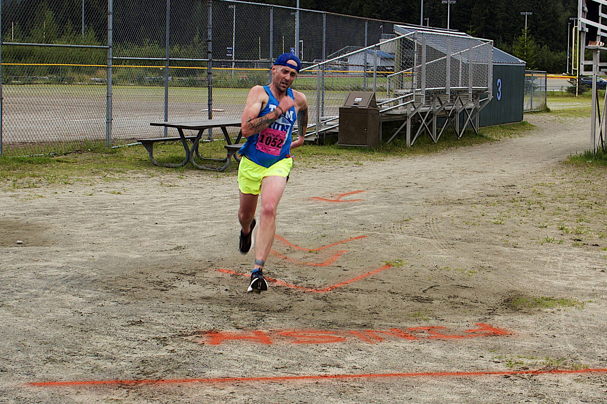 Jesse Stringer of Juneau wins the 5K portion of the 32nd Annual Beat the Odds: A Race Against Cancer on Saturday with a time of 18 minutes, 48 seconds. (Mark Sabbatini / Juneau Empire)