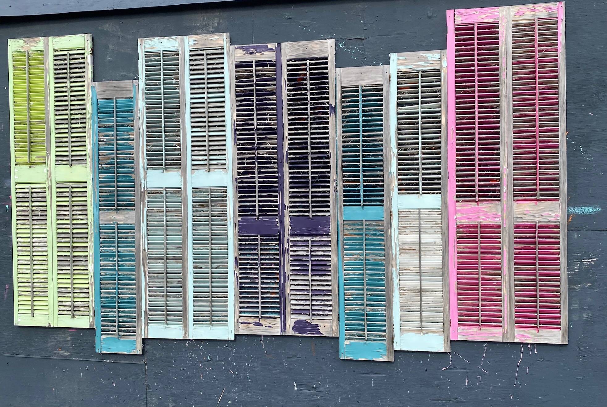 A rainbow of colored shutters by Bill Overstreet Park on Aug. 13. (Photo by Denise Carroll)