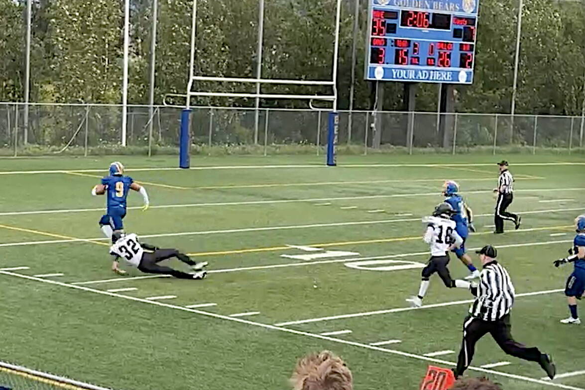Manu Satele (9) scores on a long touchdown to give Bartlett High School a 42-7 lead near the end of the second quarter during its home game against the Juneau Huskies on Saturday. (Courtesy of Juneau Huskies Football)