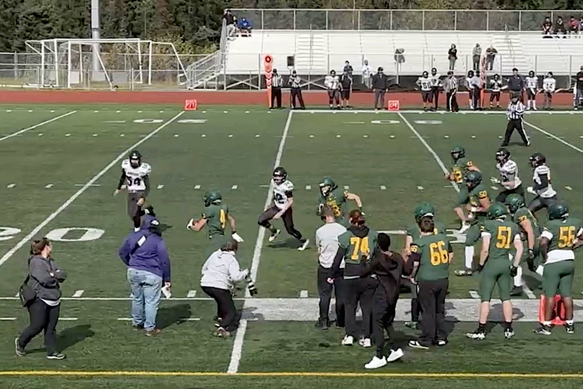 A Service High School player returns a punt deep into Juneau territory during the first quarter of Saturday’s game on the Anchorages school’s home field. Service scored its second touchdown a short time later to take a 15-0 lead before going on to win 54-14. (Courtesy of Juneau Huskies Football)