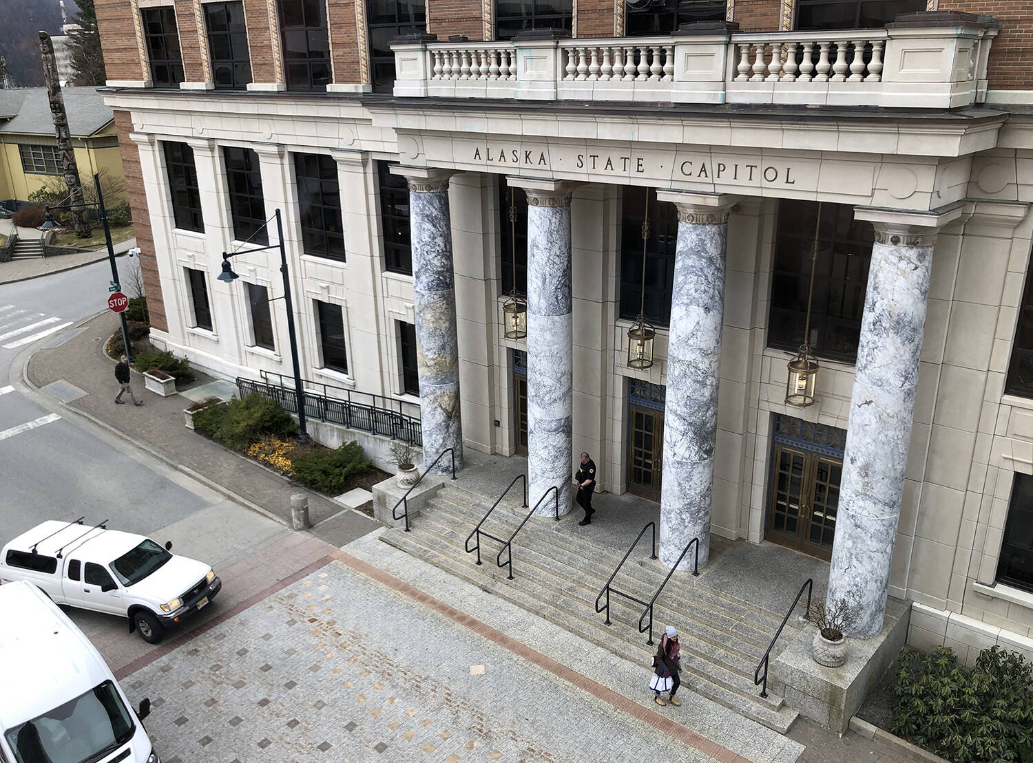 The front of the Alaska State Capitol in Juneau is seen on Wednesday, April 12, 2023. (Photo by James Brooks/Alaska Beacon)