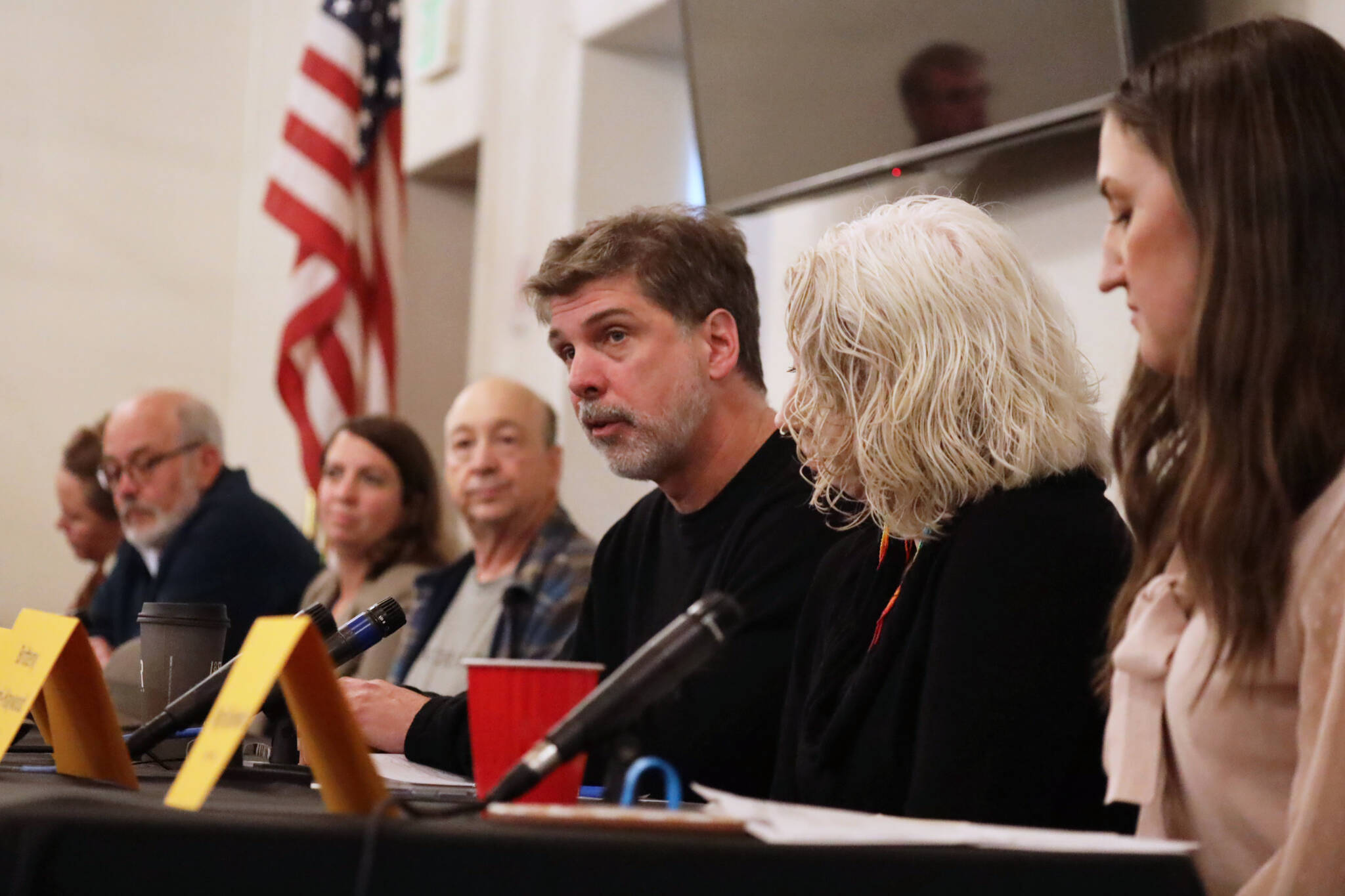 Juneau Board of Education candidate David Noon, center, answers a question during an election forum hosted by the Greater Juneau Chamber of Commerce on Thursday afternoon. (Clarise Larson / Juneau Empire)