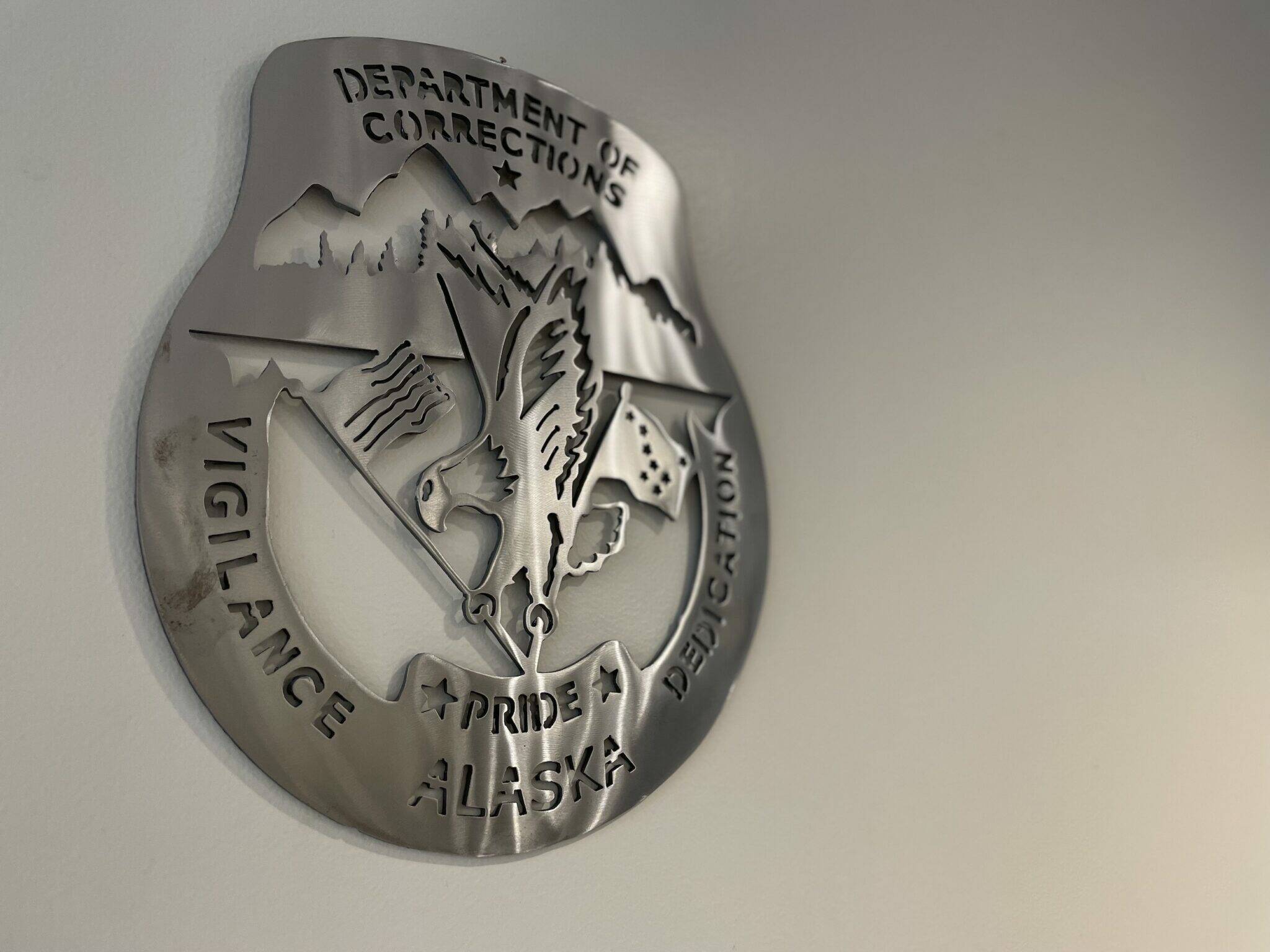 This symbol is inside of the Alaska Department of Corrections office on Sept. 7, 2022, in Douglas, Alaska. (Photo by Lisa Phu/Alaska Beacon)