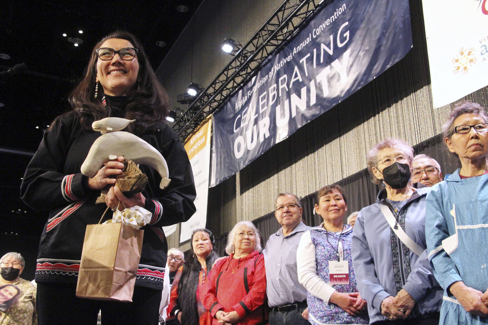 Rep. Mary Peltola, D-Alaska, acknowledges audience members singing a song of prayer for her at the Alaska Federation of Natives conference in Anchorage on Oct. 20, 2022. (AP Photo/Mark Thiessen, File)