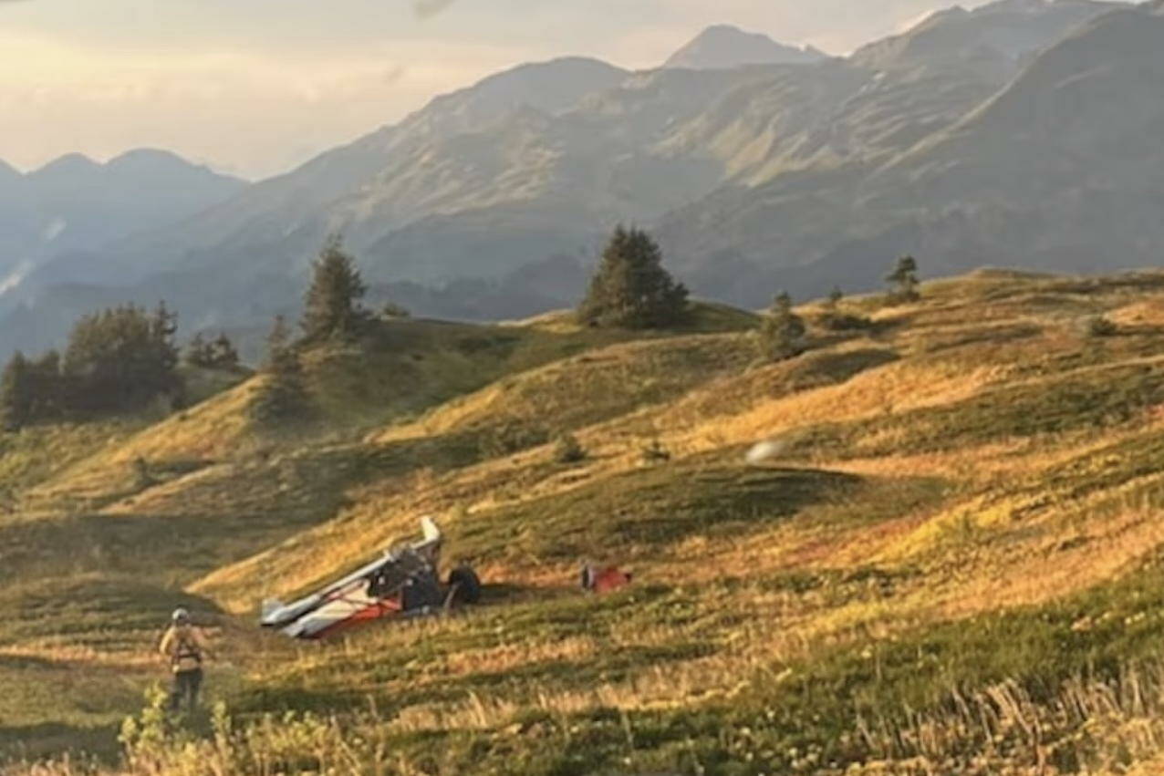 This is a photo of the crash site of a downed plane near Juneau Sunday evening. The survivor, reportedly the only person aboard the aircraft, was discovered to be in critical condition. (Courtesy / U.S. Coast Guard)