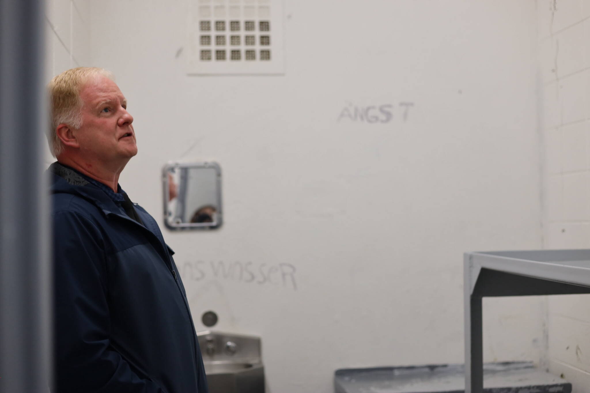 Lemon Creek Correctional Center Superintendent Bob Cordle examines cracks in the walls of a cell Monday. The prison is currently undergoing structural repairs and renovations following “extreme wet weather” last fall that caused instability at certain locations and prompted emergency repairs. (Clarise Larson / Juneau Empire)