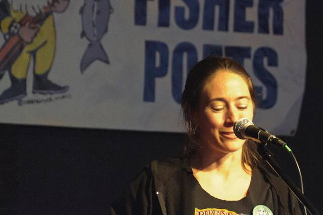 Author Tele Aadsen performing at her first FisherPoets Gathering in 2012. Her book, “What Water Holds,” is a collection of essays she wrote for the annual festival over the next 12 years. (Photo courtesy Pat Dixon)