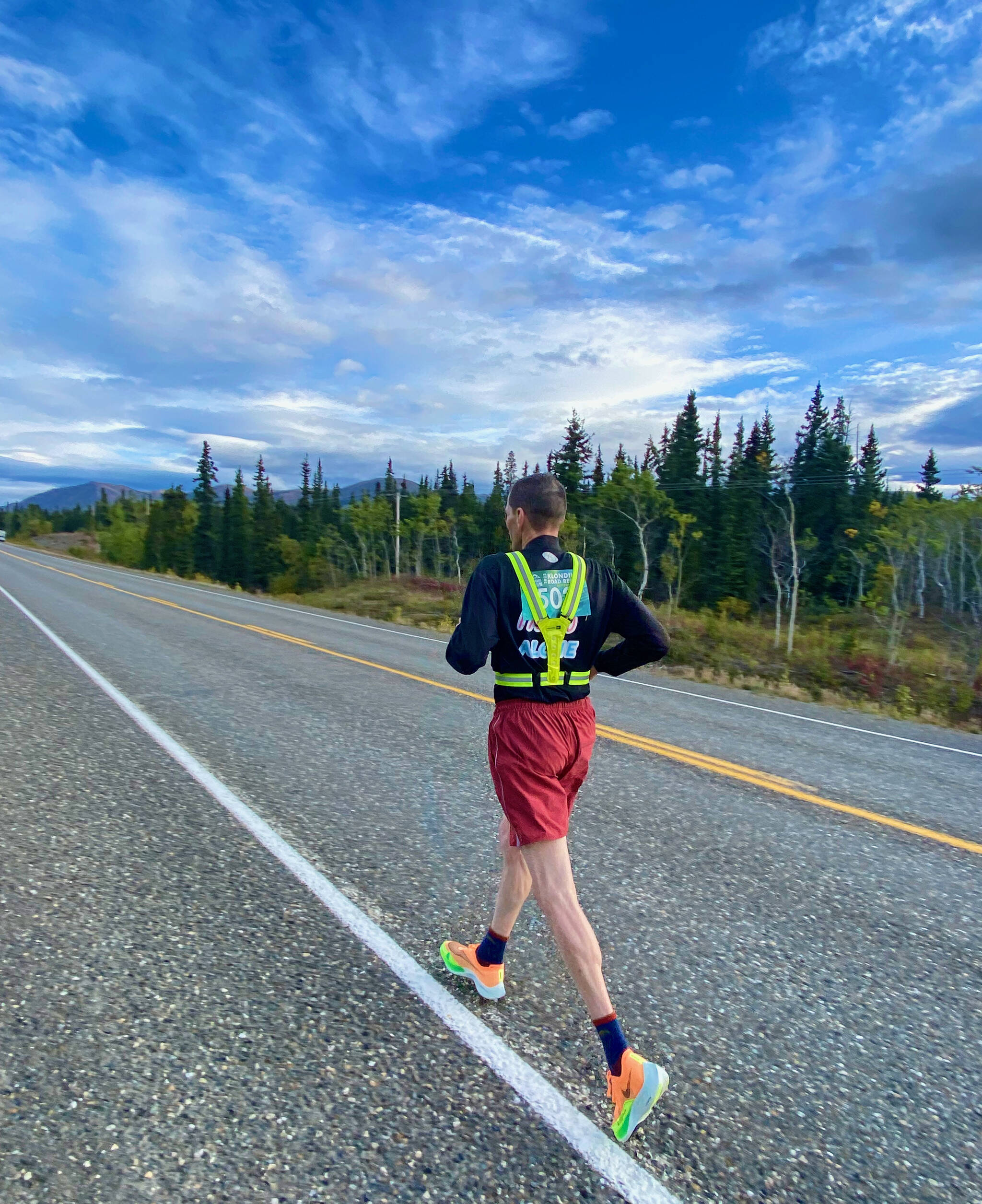 Klas Stolpe runs along the Klondike Highway during the 44-mile solo ultra of the 40th Annual Klondike Road Relay, Saturday, Sept. 9. Stolpe was running as team No One Fights Alone in support of his brother James who is fighting cancer. (Tom Thompson photo)