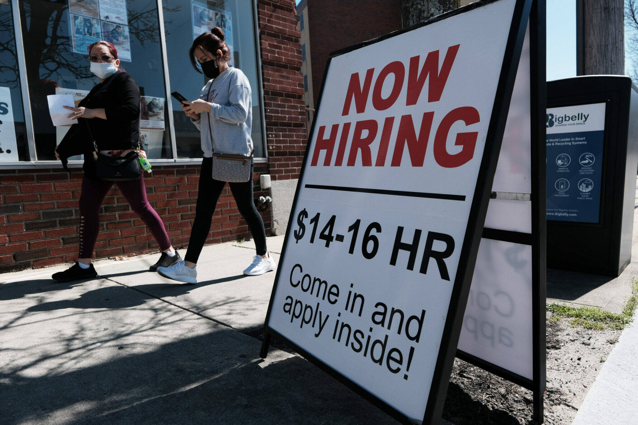 A company advertises a help wanted sign on April 9, 2021 in Pawtucket, Rhode Island. (Photo by Spencer Platt/Getty Images)