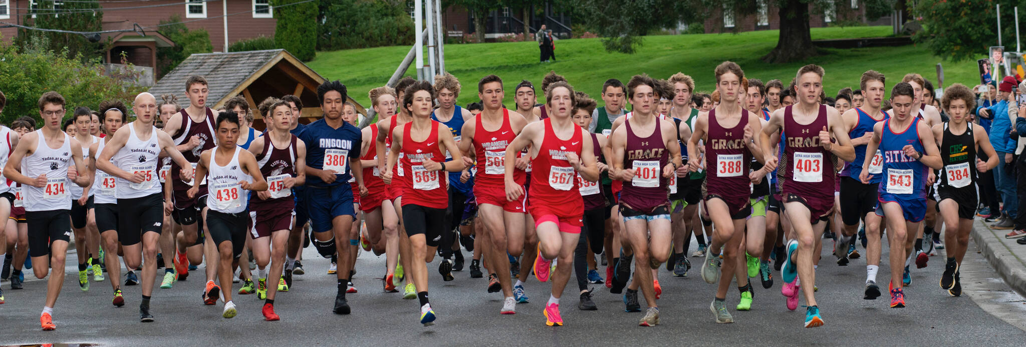 High school runners start the Sitka Invitational Boys 5K race on Saturday. The field included 150 runners in the boys field and 91 in the girls. (James Poulson / Sitka Sentinel)