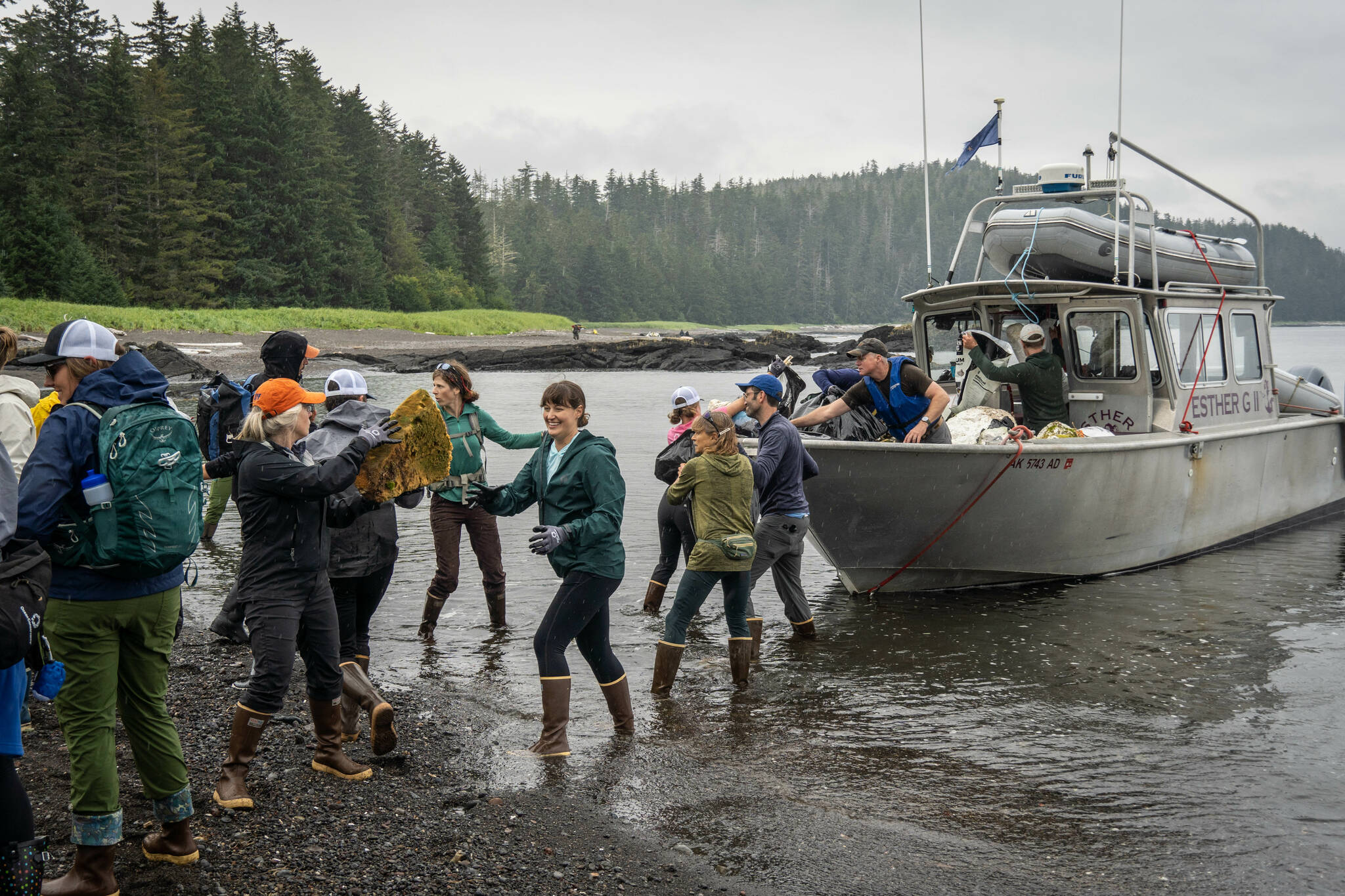 More than 40 volunteers from a range of organizations including congressional members, tribal governments, environmental organizations, visiting social media influencers and more worked side-by-side removing 1,400 pounds of trash from coasts near Sitka in August. (Ryan Morse / Sitka Conservation Society)