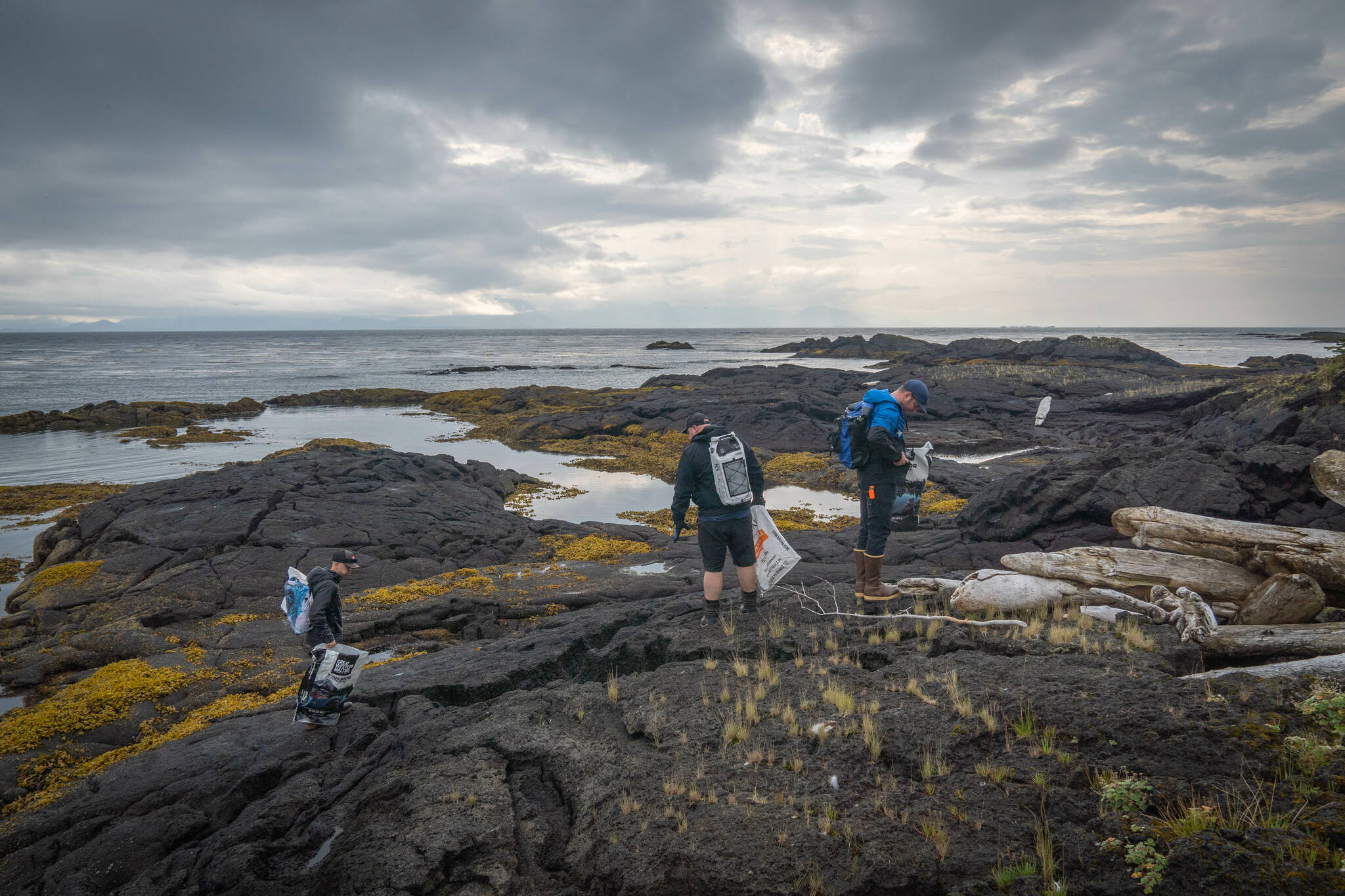 The kickoff of the 38th Annual International Coastal Cleanup began on the volcanic beaches at the base of L’ux, a stratovolcano also known as Mt. Edgecumbe on Kruzof Island, 14 miles from Sitka in August. (Ryan Morse / Sitka Conservation Society)