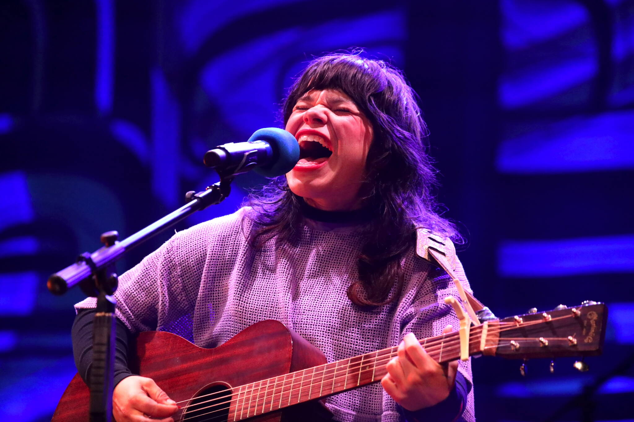 Samantha Crain, of the Choctaw Nation, sings to the crowd during a performance Thursday night as part of the Áak’w Rock music festival at Centennial Hall. (Clarise Larson / Juneau Empire)