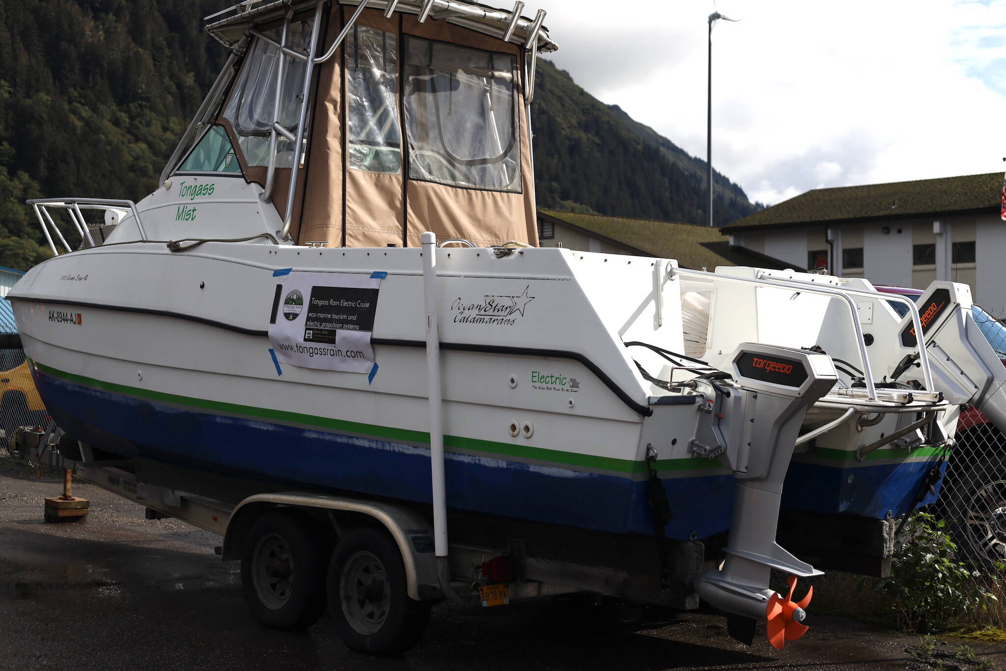 The Tongass Mist, a fully electrified custom-built boat, was one of the many vehicles parked at Juneau’s EV & E-bike Roundup downtown Saturday afternoon. (Clarise Larson / Juneau Empire)