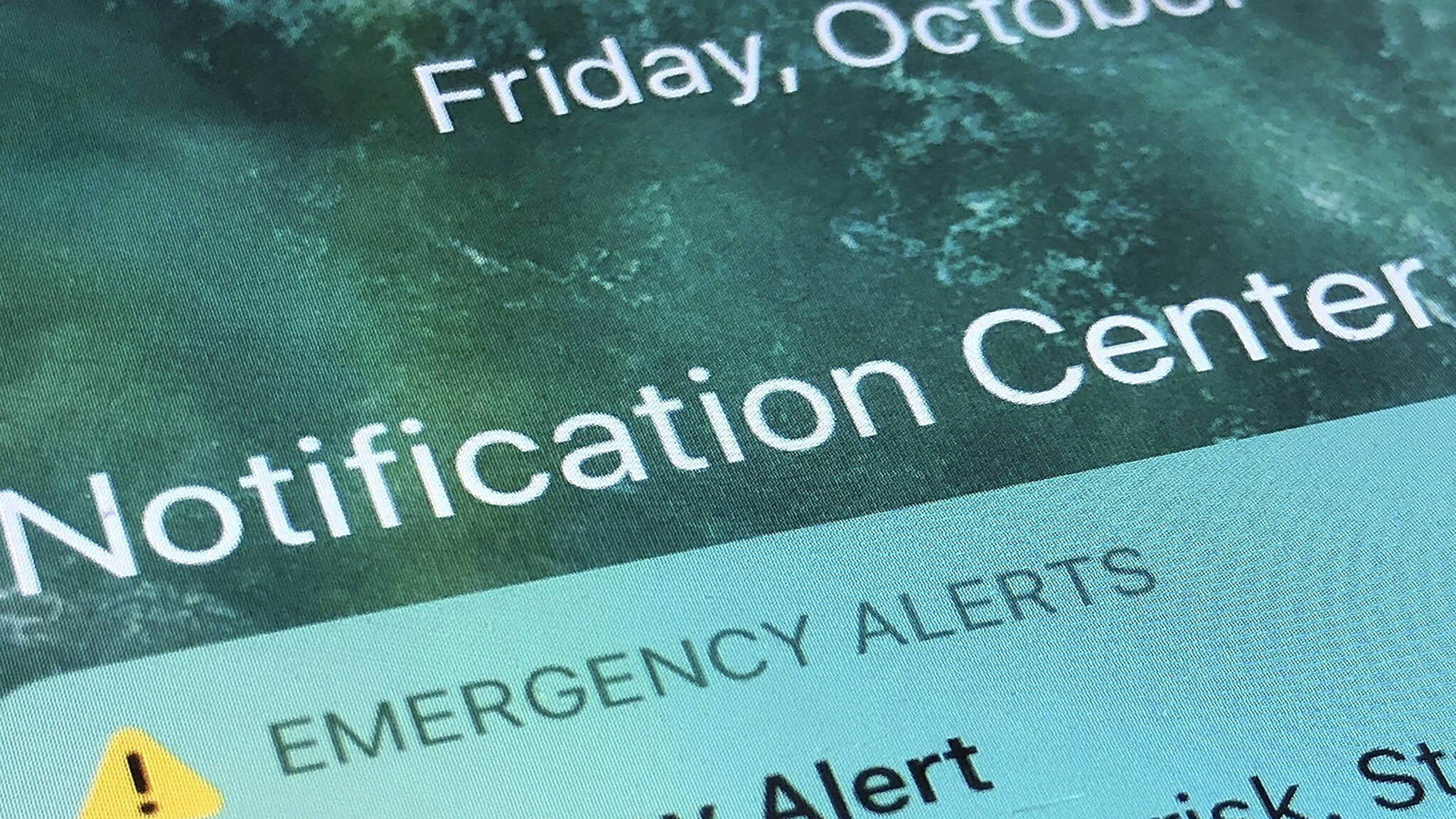 An emergency alert is displayed on a cellphone, Oct. 30, 2020, in Rio Rancho, N.M. (AP Photo/Susan Montoya Bryan, File)