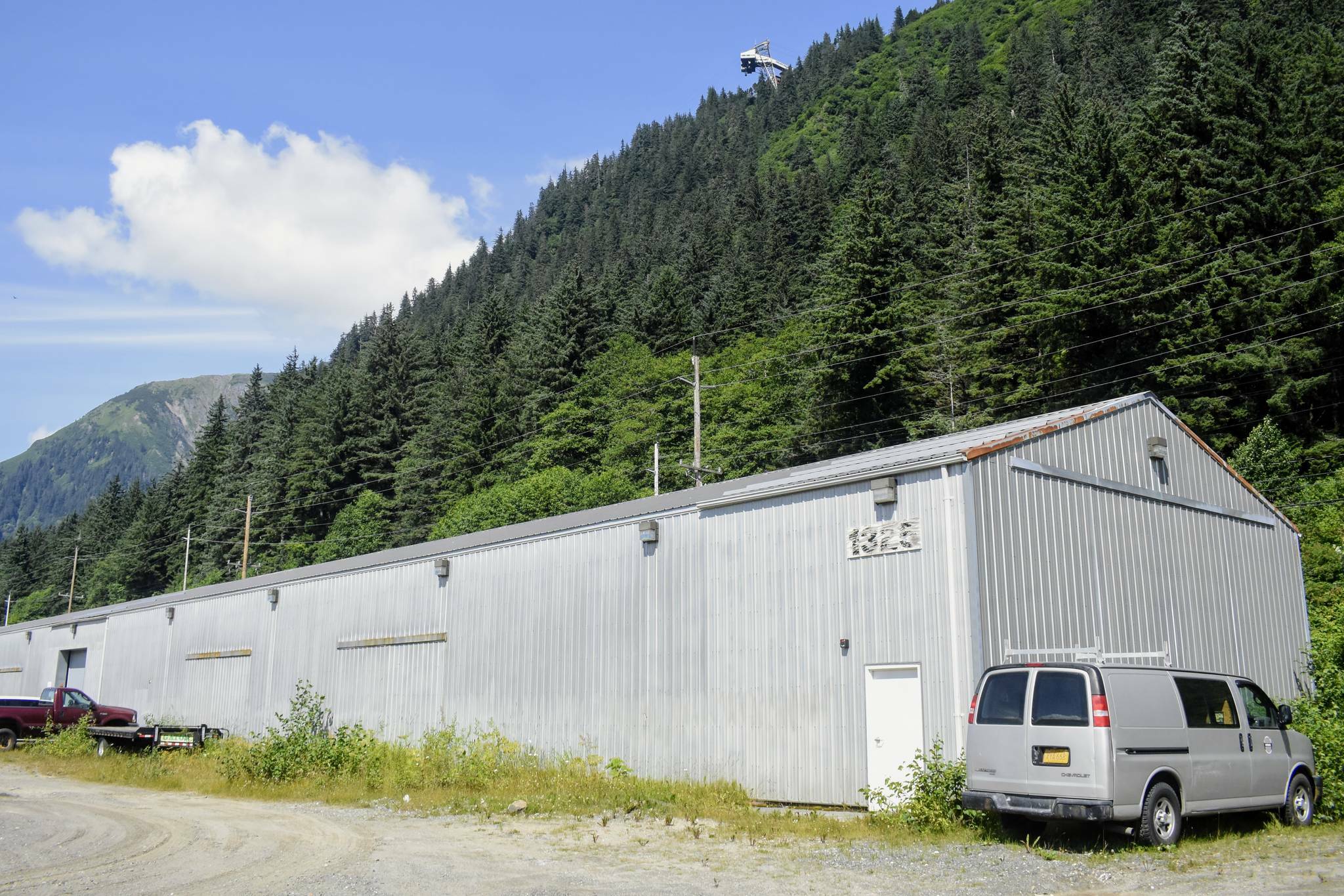 A former surplus warehouse at 1325 Eastaugh Way, seen here in 2021 and now used as a city election ballot processing center, is the current preferred location of a winter warming shelter, officials said Monday. (Peter Segall / Juneau Empire File)