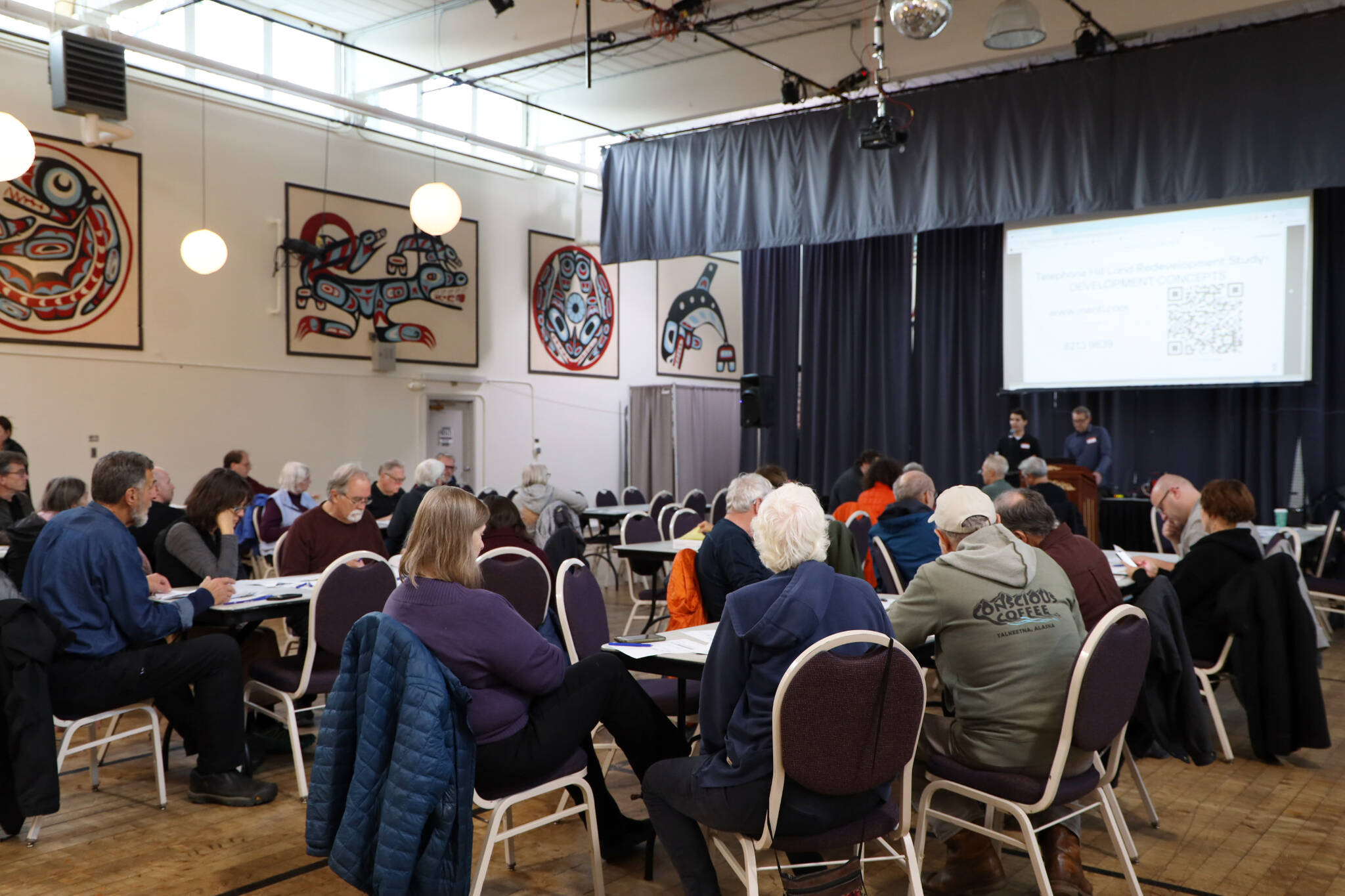 Dozens of residents packed into the Juneau Arts and Culture Center Wednesday evening during an open house to discuss Telephone Hill developments. (Clarise Larson / Juneau Empire)