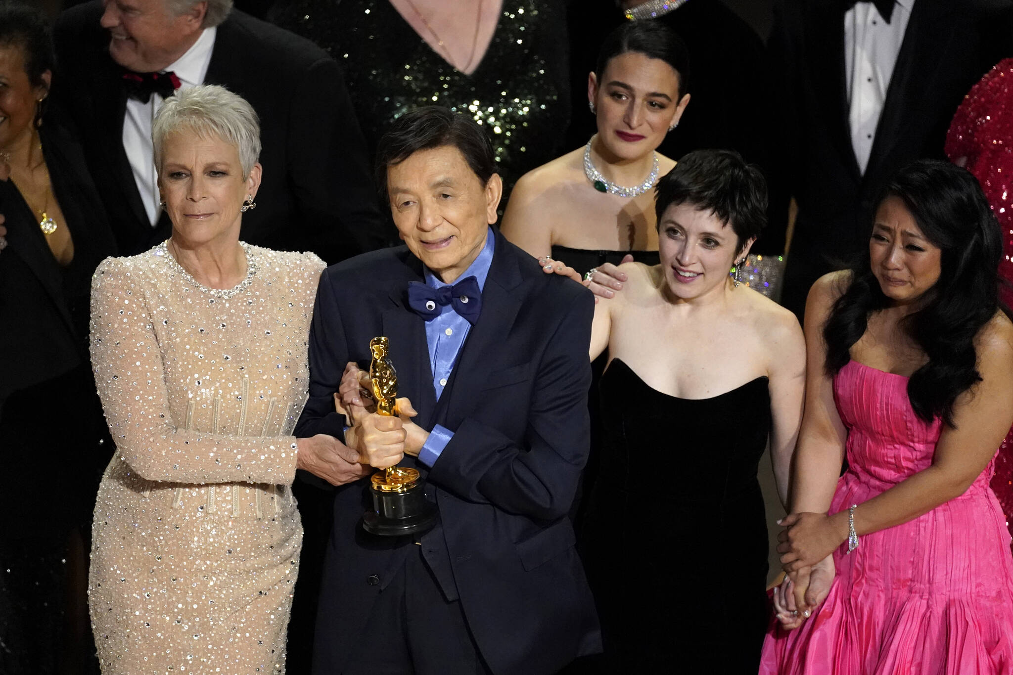 Jamie Lee Curtis, from left, James Hong, Jenny Slate, Tallie Medel and Stephanie Hsu accept the award for best picture at the Oscars on Sunday, March 12 at the Dolby Theatre in Los Angeles. (AP Photo/Chris Pizzello)