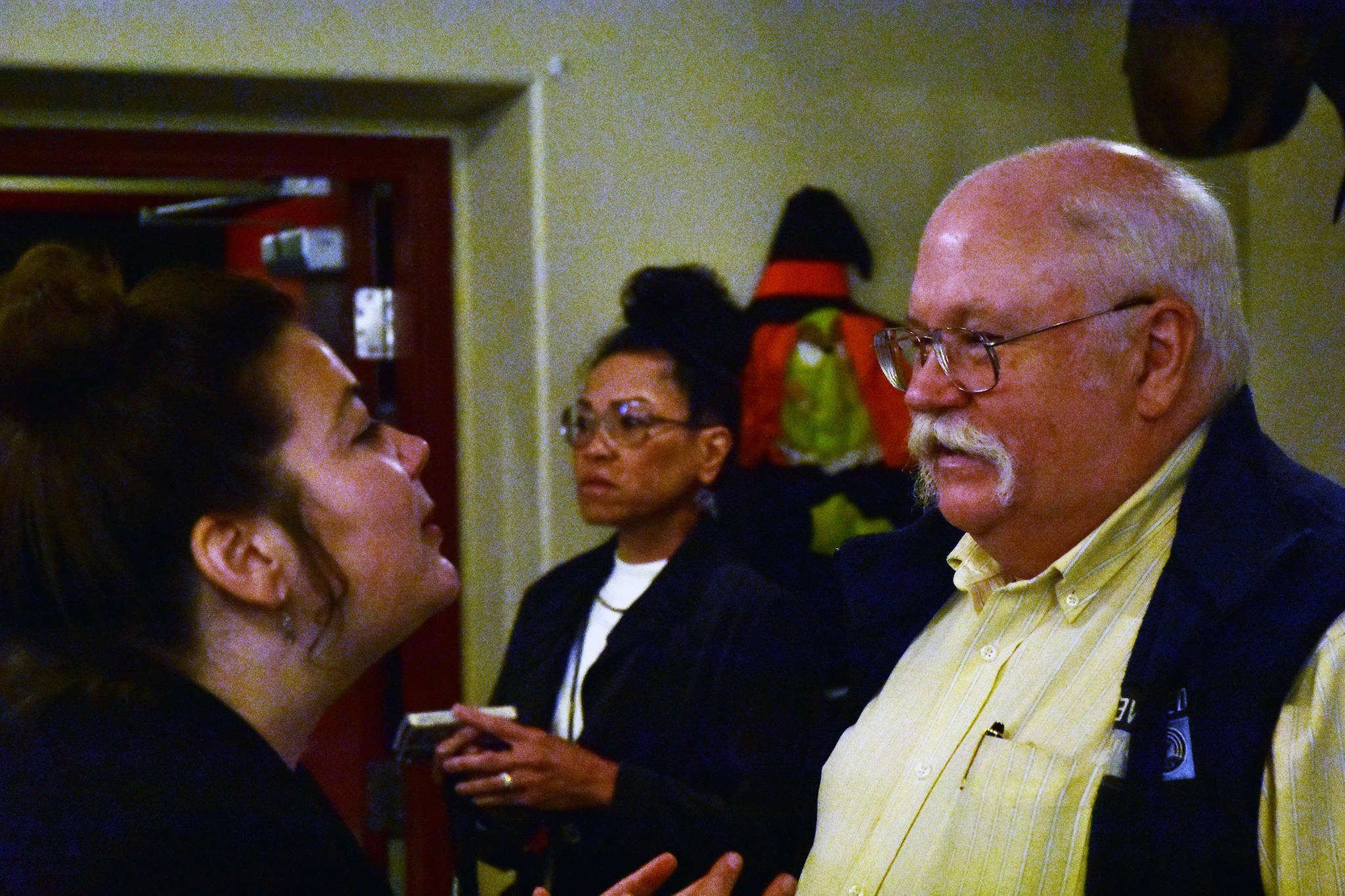 Wayne Stevens, right, president and CEO of United Way of Southeast Alaska, greets a person at the Juneau Chamber of Commerce Luncheon at the Moose Family Lodge on Thursday, Oct. 17, 2019. Stevens retired as head of the organization last month, but remains active in its causes. (Peter Segall / Juneau Empire File)