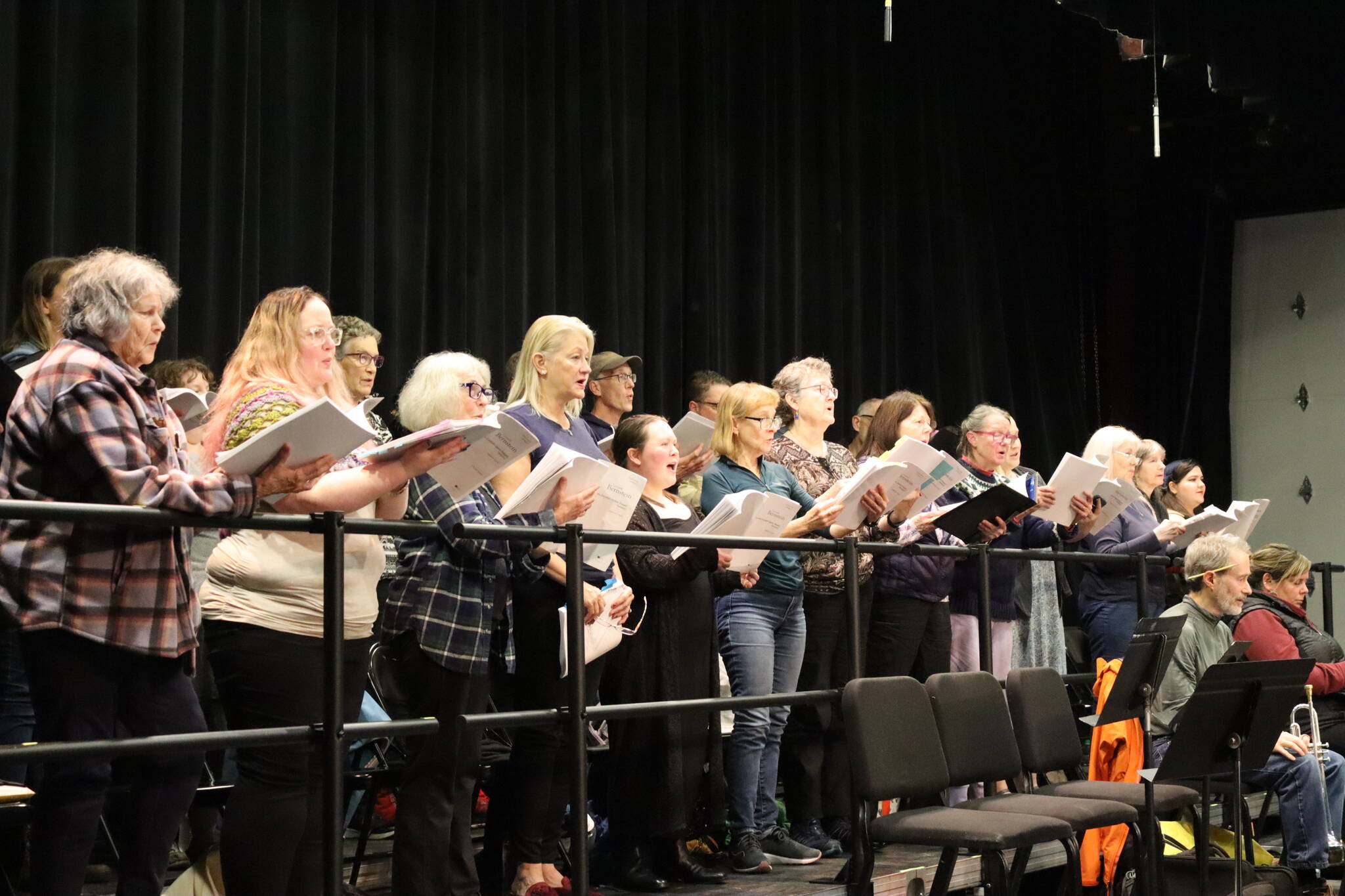 The concert version of “Candide,” a collaboration of Juneau Symphony and Juneau Lyric Opera to be staged this weekend at Juneau-Douglas High School: Yadaa.at Kalé, includes a 40-person chorus. (Meredith Jordan/ Juneau Empire)