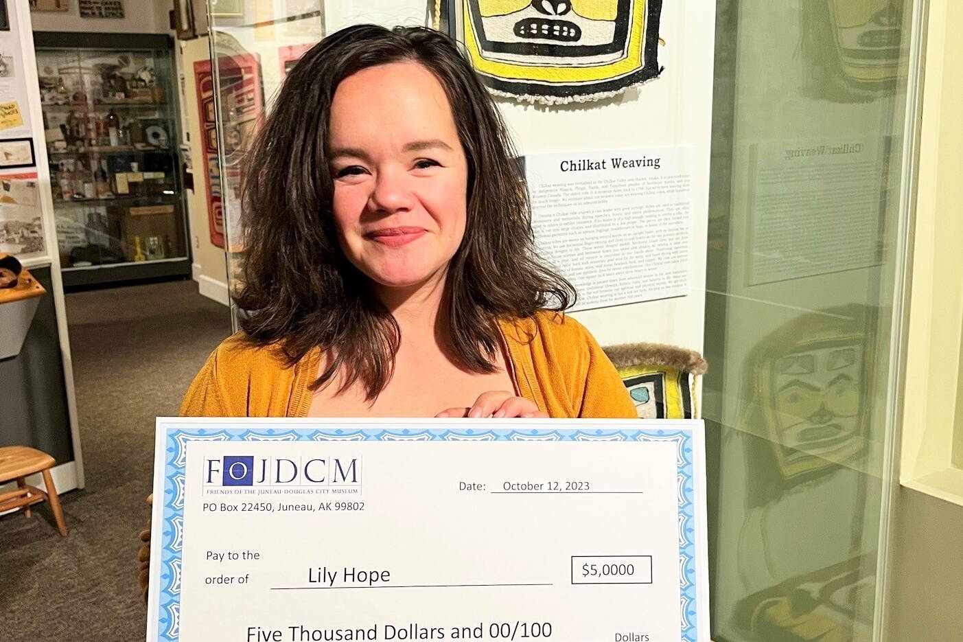 Lily Hope is presented with the $5,000 Marie Darlin Prize at the Juneau-Douglas City Museum on Oct. 12. (Photo courtesy of Juneau-Douglas City Museum)