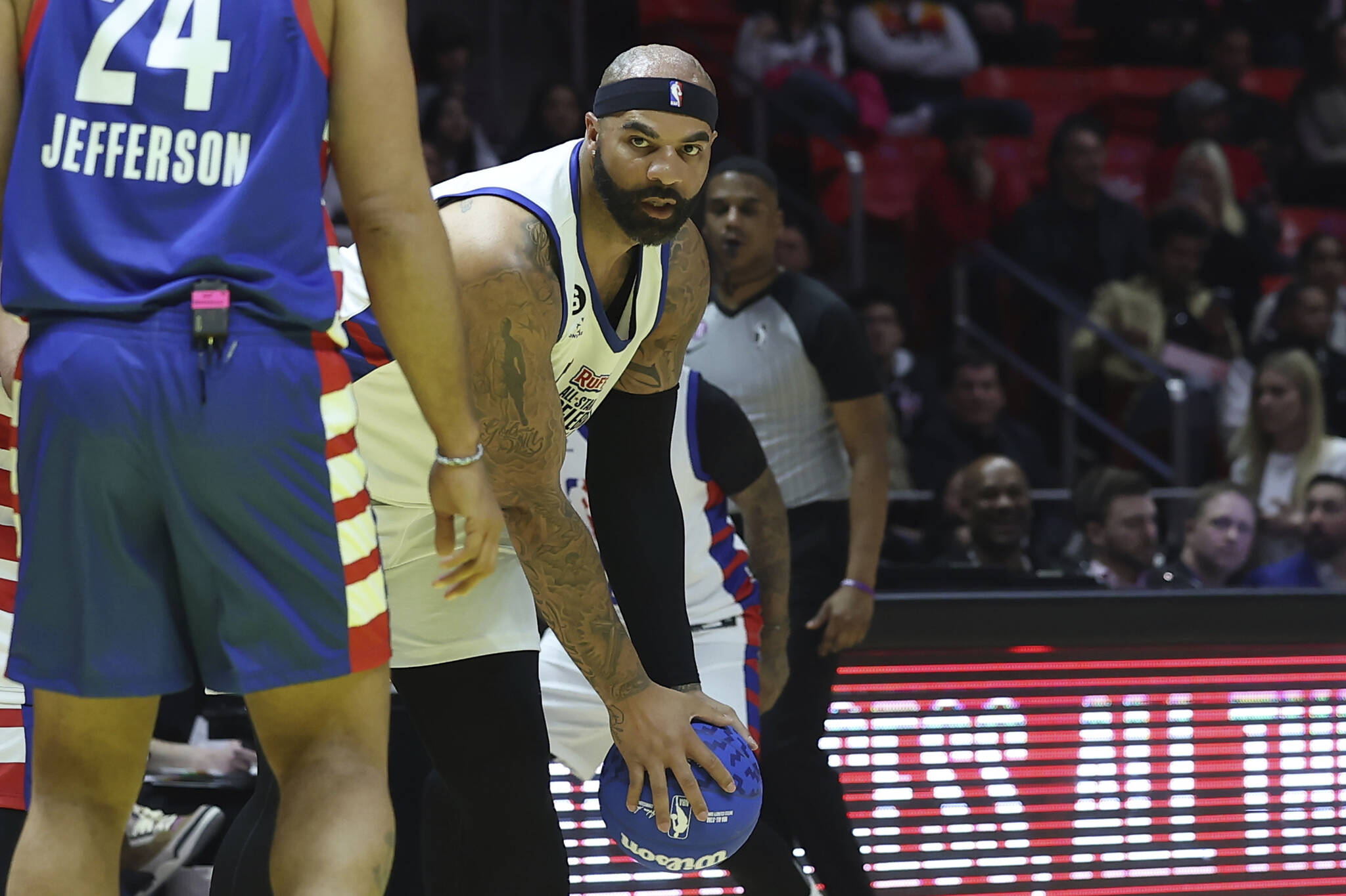 NBA basketball legend Carlos Boozer looks to move the ball in the second half of an NBA All-Star Celebrity Game, Friday, Feb. 17, 2023, in Salt Lake City. (AP Photo/Rob Gray)