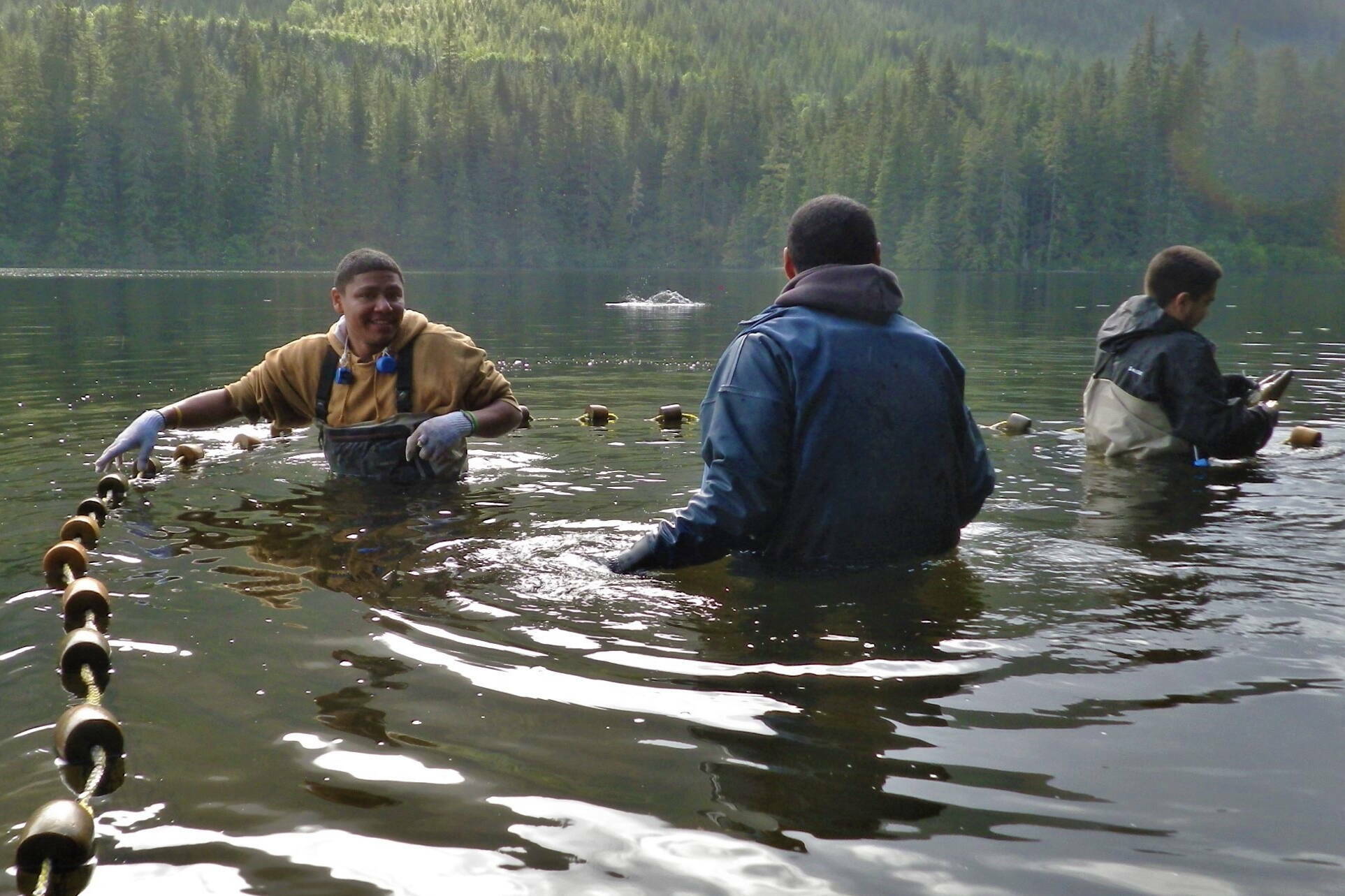 Fishers set out equipment a short distance from shore in the Tongass National Forest. A collective $110 million in public investment for mariculture in Alaska is occurring via federal and other funding. (Courtesy Photo/U.S. Forest Service)