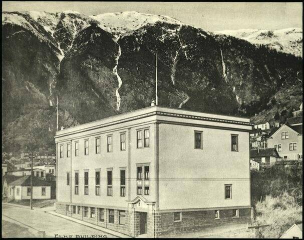 An undated photo shows the three-story Elks Lodge No. 420 building in downtown Juneau before going through extensive renovations including the removal of its top floor. (Photo from the City and Borough Community Development’s Historic Structure Database)