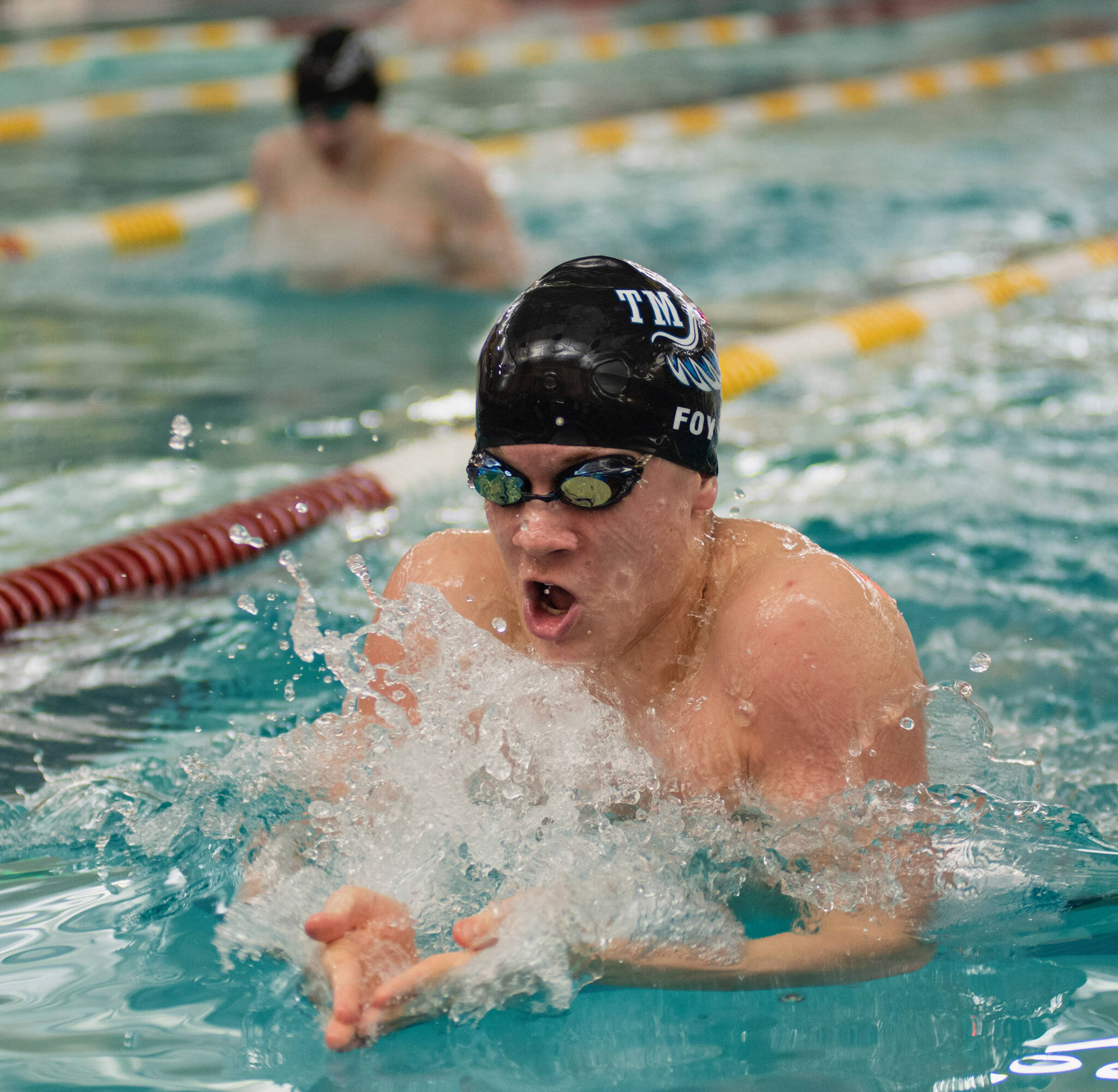 Thunder Mountain High School senior PJ Foy swims to victory in the 100 breast at last weekend’s Region V Championships in Sitka. The multi-state record holder will be looking to add to his total this weekend at Juneau’s Dimond Park Aquatic Center. (James Poulson/Daily Sitka Sentinel)