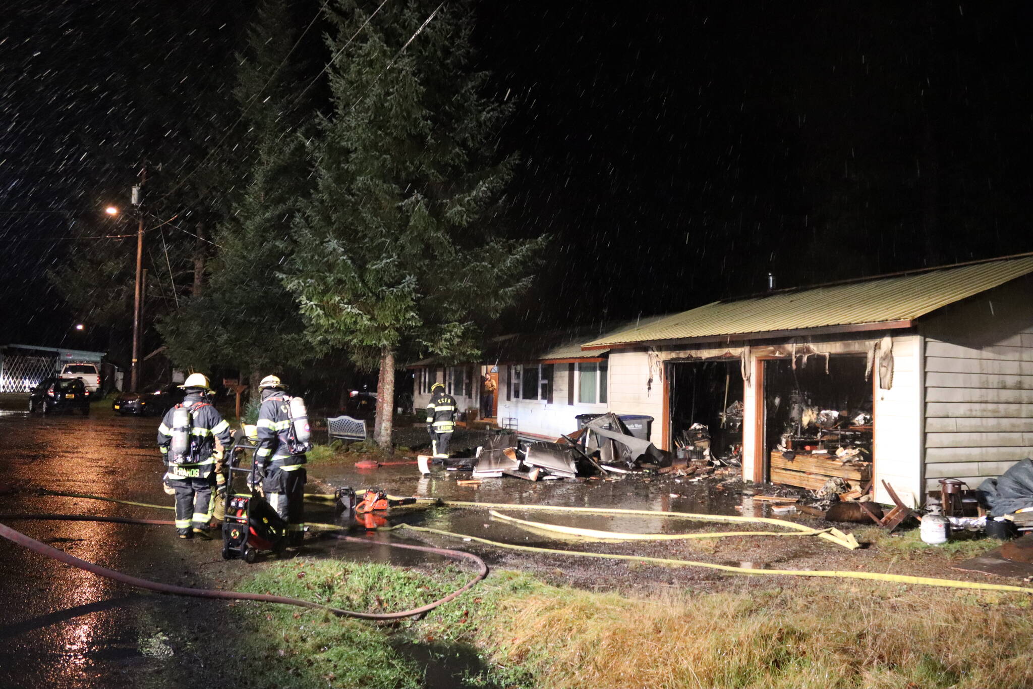 Capital City Fire/Rescue responds to a garage fire on El Camino Street on the evening of Monday, Nov. 13. CCFR issued a reminder for people to be proactive in protecting their homes after four fires were reported over the course of five days. (Meredith Jordan/ Juneau Empire)