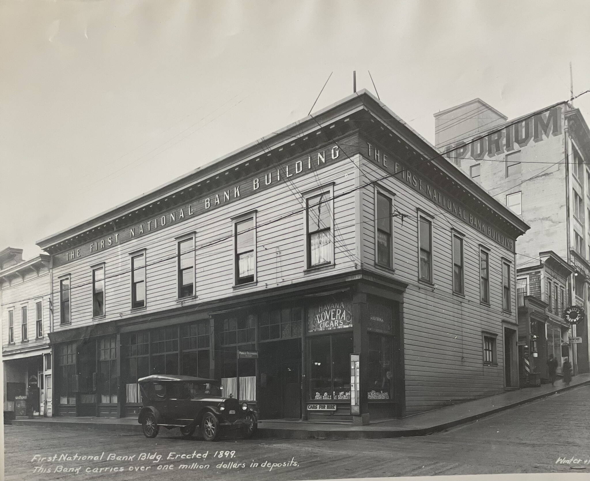 The First National Bank opened in December of 1898 in the Lewis Building at the corner of Front and Seward Streets after a short time in a different location nearby. (Photo credit ASL-P87-0969)