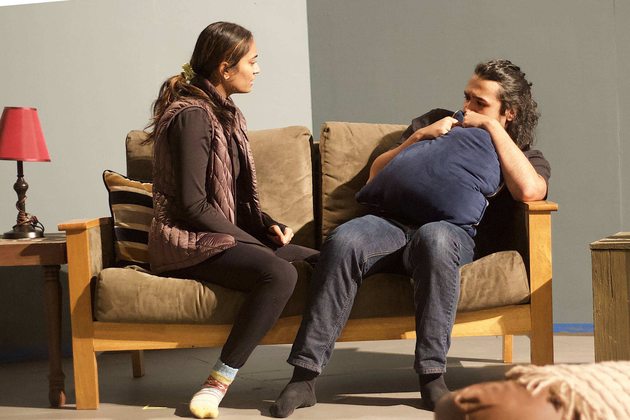 Aditi Sanghvi, left, confronts Tristan Cameron about relationship issues during a rehearsal scene Tuesday night for Perseverance Theatre’s upcoming production of “A Nice Indian Boy.” (Mark Sabbatini / Juneau Empire)