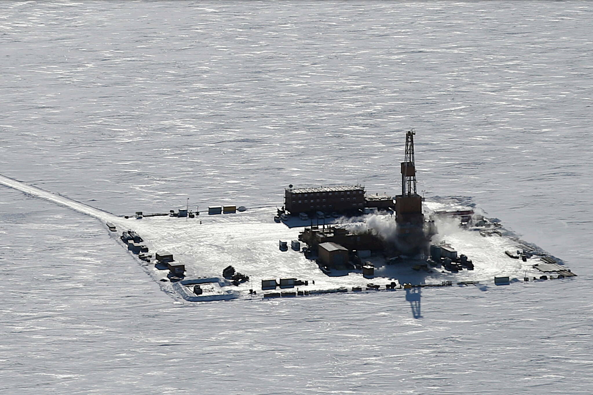 A ConocoPhillips oil rig operating during winter on Alaska’s North Slope is featured on the cover of the U.S. Bureau of Land Management’s report recommending approval of the Willow oil project. (U.S. Bureau of Land Management)