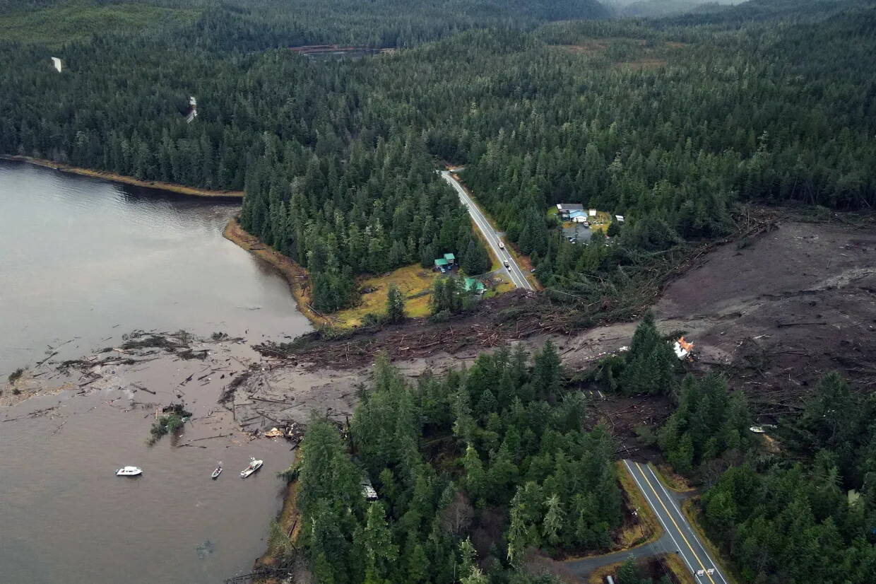 An aerial view of mud and forest debris that buried a stretch of the Zimovia Highway a day after a landslide struck an area of Wrangell on Nov. 21. (Photo courtesy of the Alaska Department of Transportation and Public Facilities)