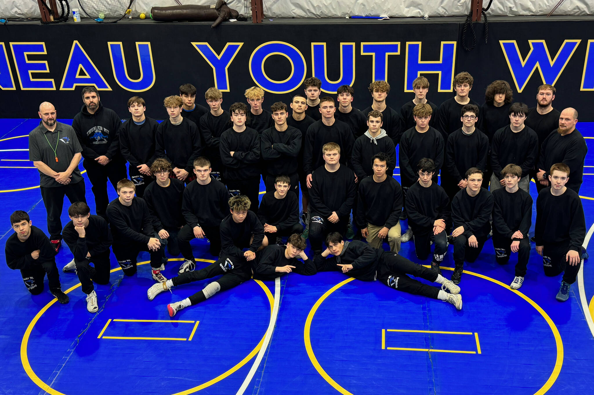 The Thunder Mountain High School wrestling team, made up of TMHS and Juneau-Douglas High School: Yadaa.at Kalé athletes, will host the Region V Wrestling Championships on Friday and Saturday in the TMHS Thunderdome gym. (Photo courtesy of TMHS)