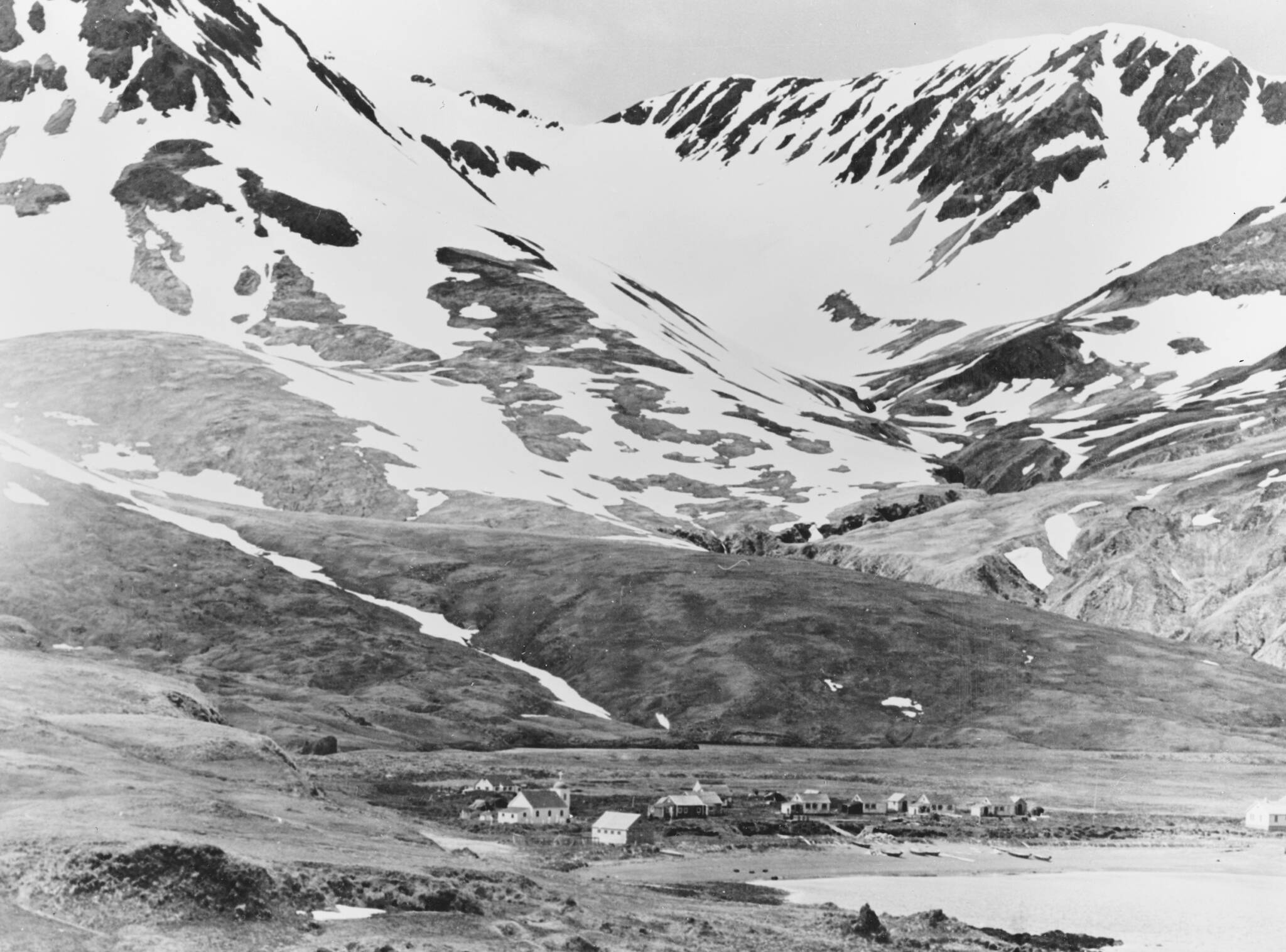 This photo provided by the Library of Congress shows the village of Attu, Alaska, in June 1937. Gregory Golodoff, who was 3 years old when his remote Alaska island was captured by Japanese troops and who became the last survivor among its 41 residents sent to Japan as prisoners, died Nov. 17, 2023. The island of Attu in the Aleutian chain was one of just a few U.S. territories taken by enemy forces during the war, and the American effort to reclaim it amid frigid rain, dense fog and hurricane-force winds was the only battle of the war fought on North American soil. (Courtesy of Library of Congress via AP)