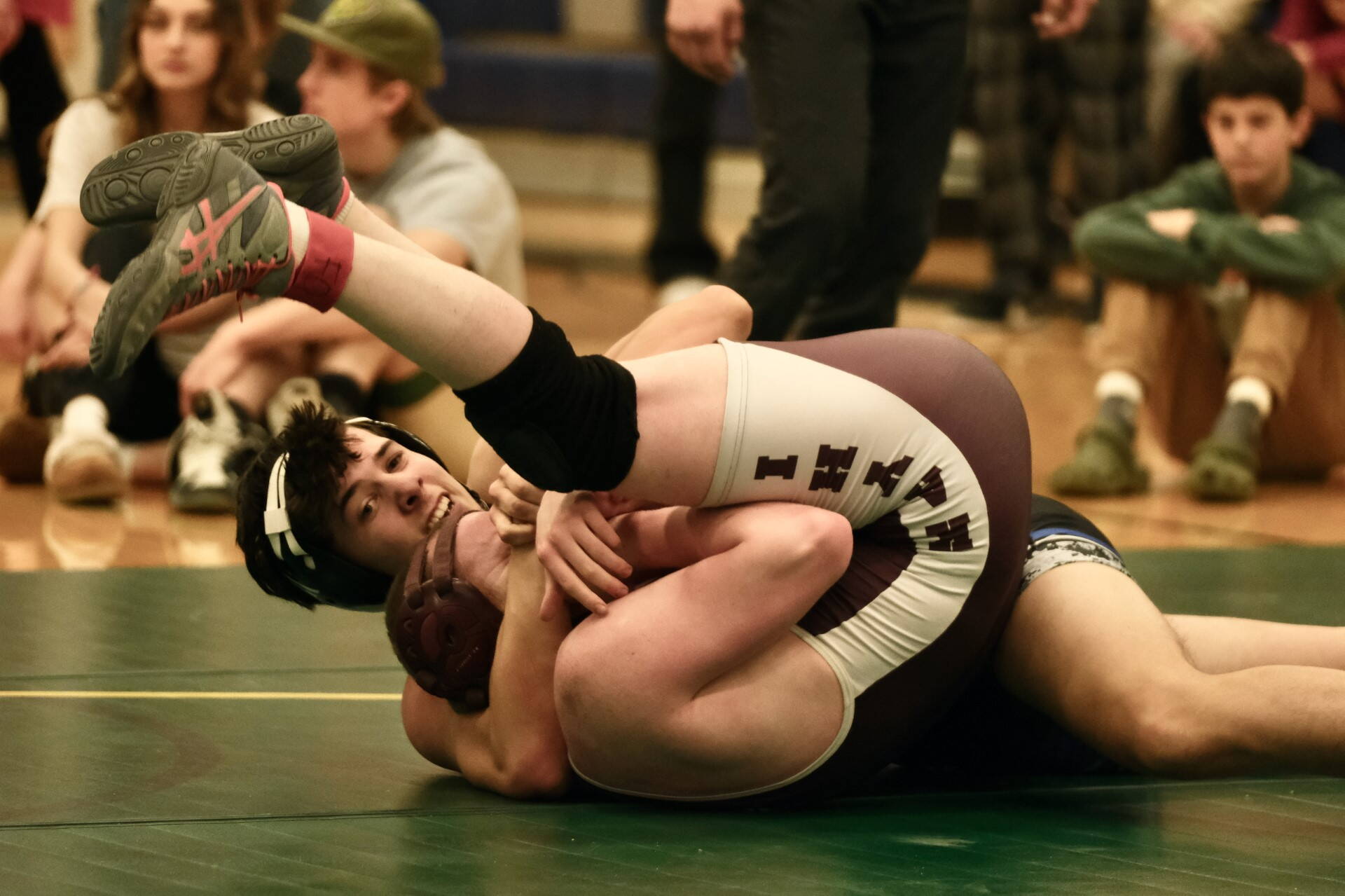 Thunder Mountain senior Liam Hart uses a cradle to pin Ketchikan High School junior Easton Yoder in the 189-pound Division I championship match of the 2023 ASAA Region V wrestling tournament, Saturday, at Thunder Mountain High School. (Klas Stolpe/ For the Juneau Empire)