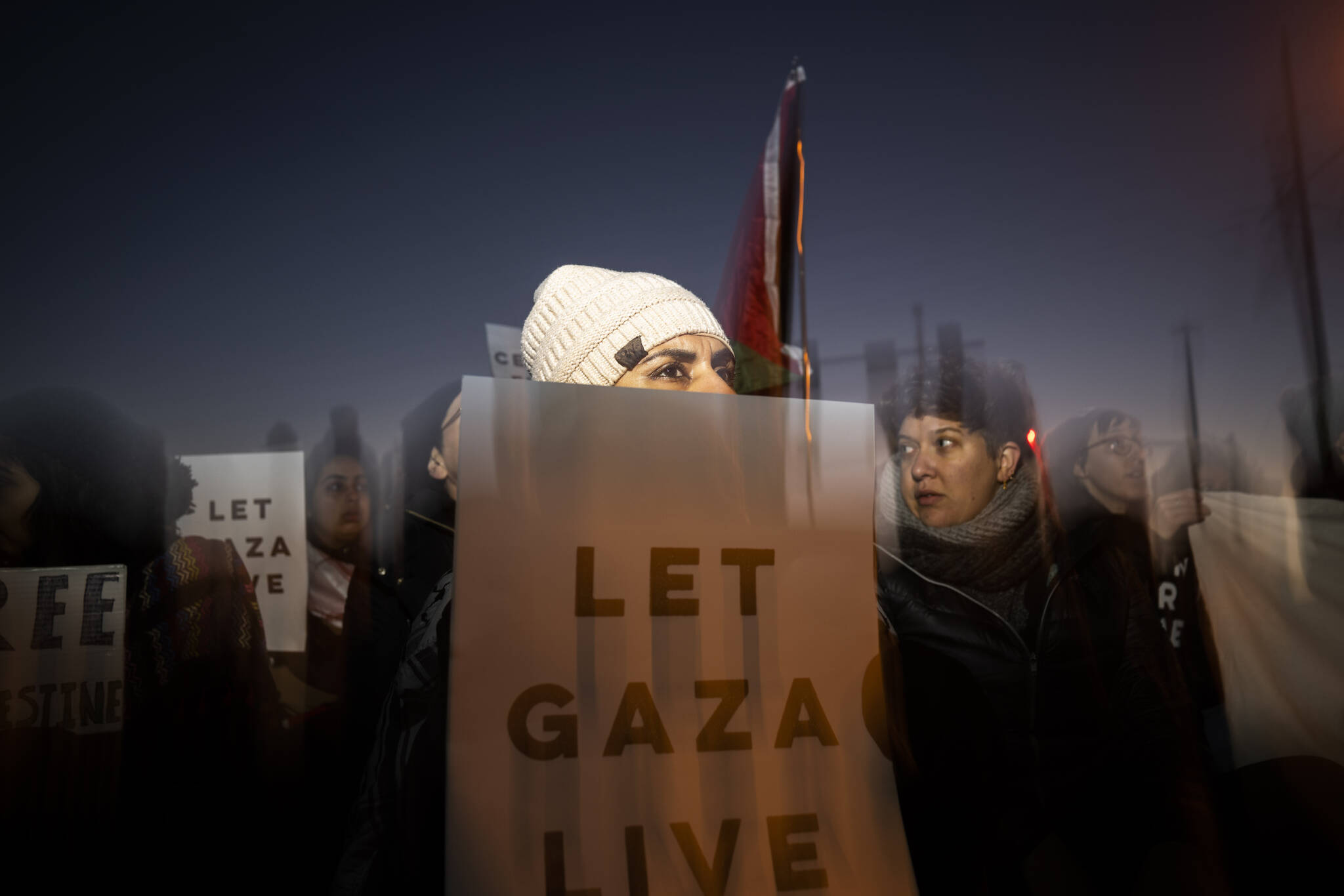 Demonstrators shut down the Spring Garden Street Bridge during a Pro-Palestinian rally on Thursday in Philadelphia. More than 200 people gathered to call for a ceasefire in Gaza. (AP Photo/Joe Lamberti)