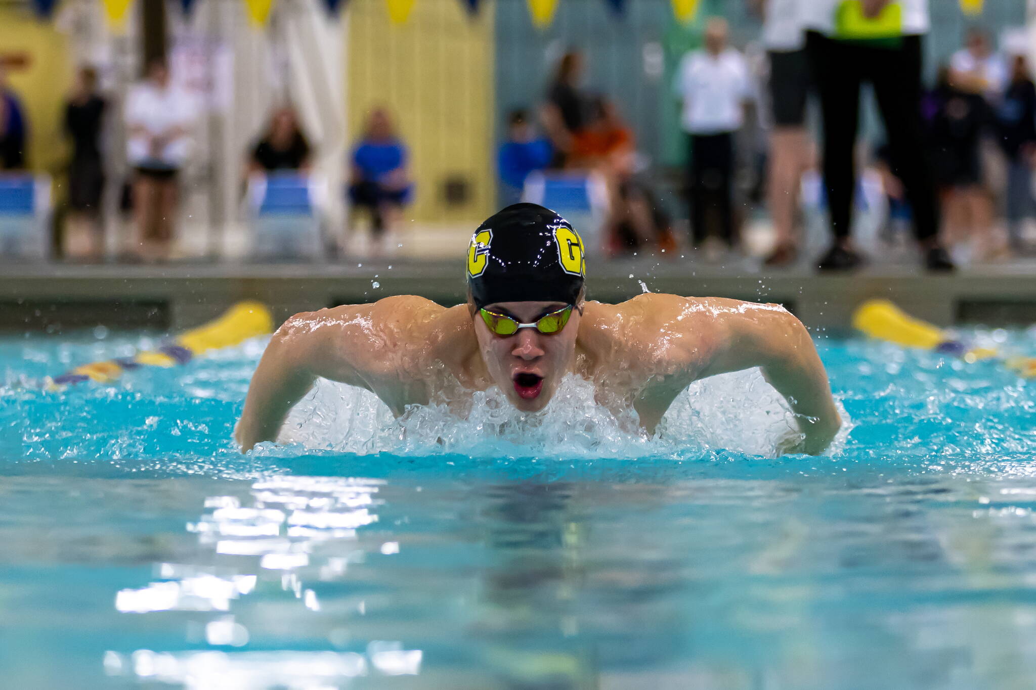 PJ Foy swims the butterfly at  the Speedo Winter Junior Championships in Westmont, Illinois. (Kevin Tuning / Forever Still Photography)