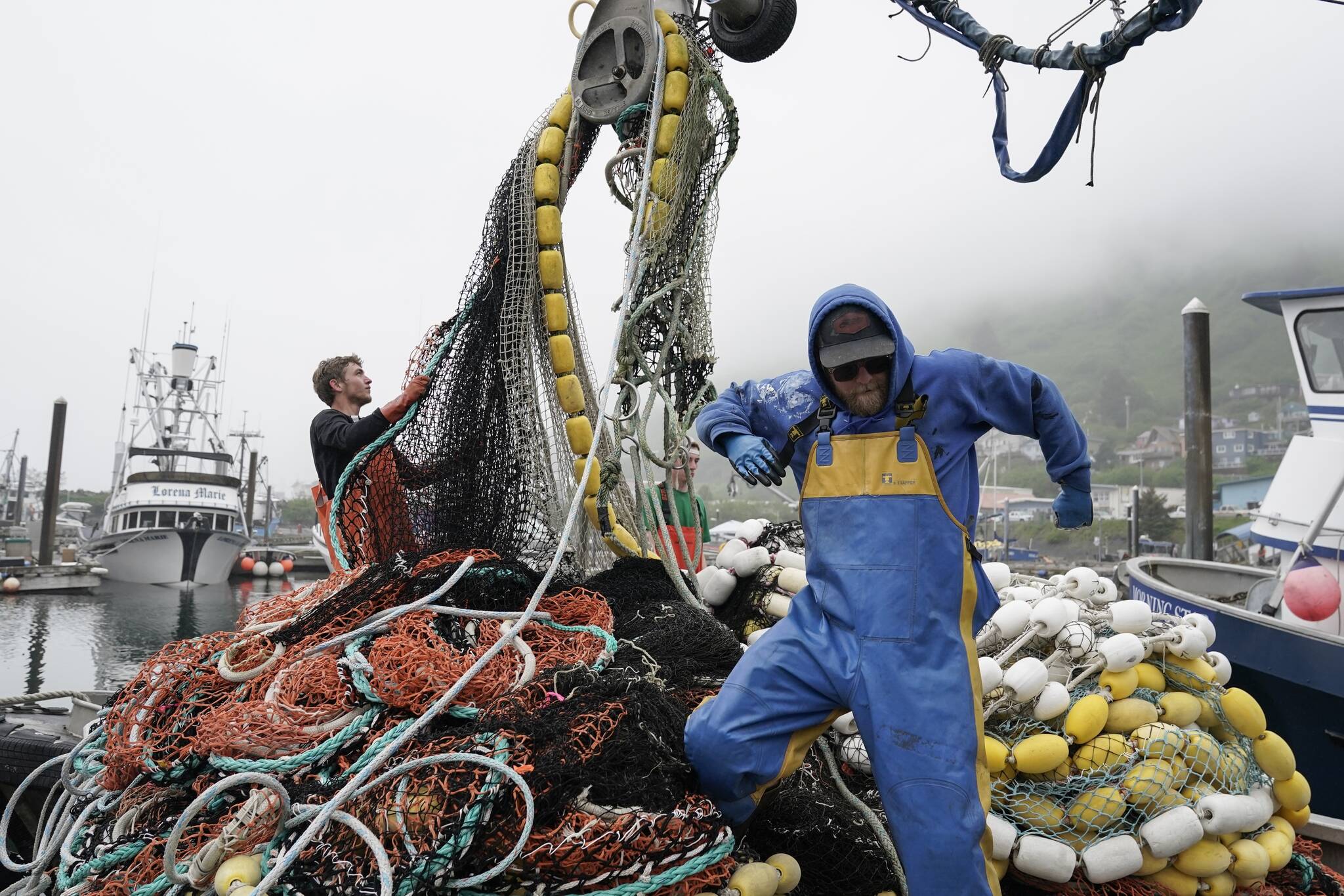 Salmon fisherman stack their nets June 22 in Kodiak. (AP Photo/Joshua A. Bickel, File)