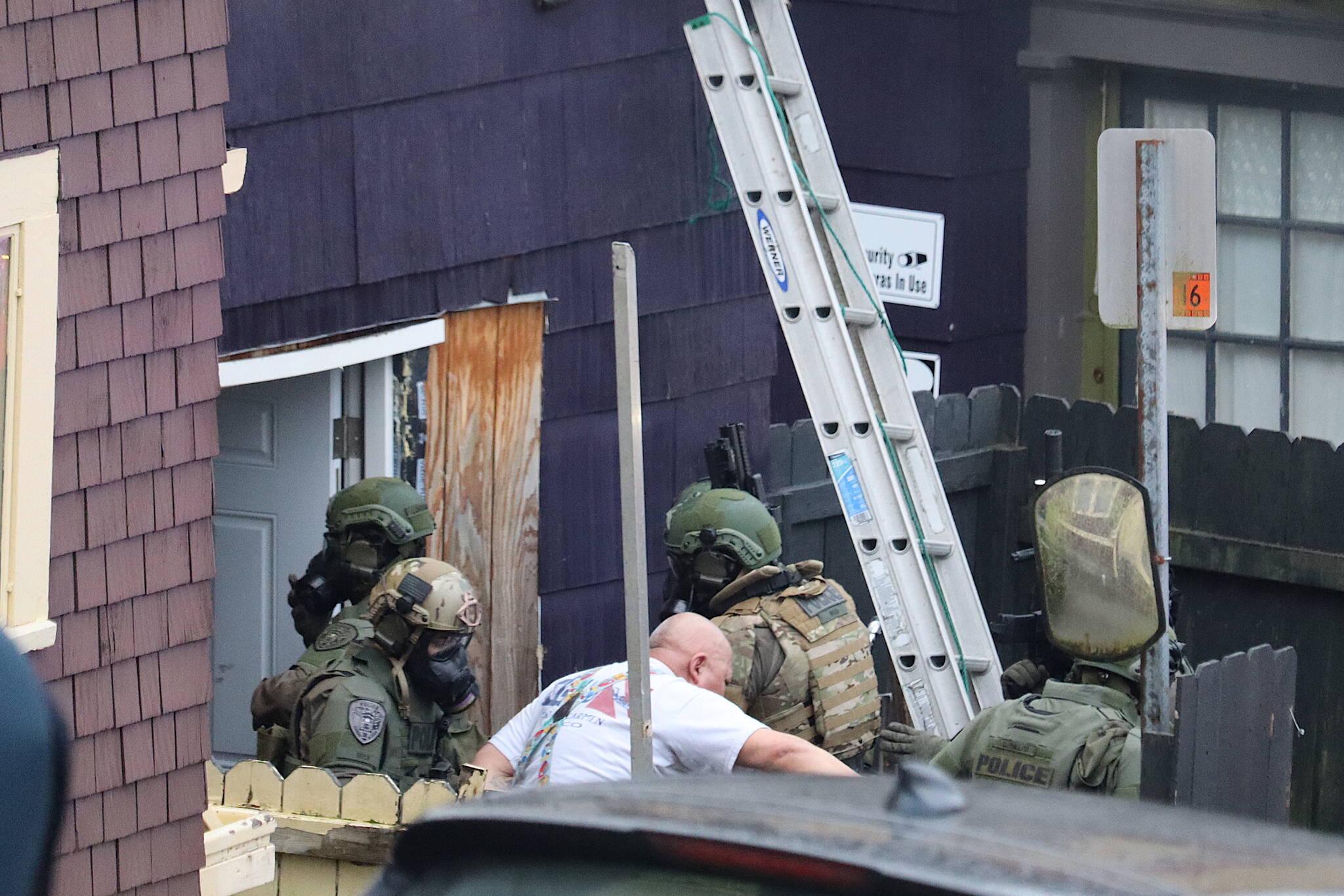 Kenneth Kitka, 65, is taken into custody following a nearly three-hour standoff with police at a downtown Juneau residence on Thursday. (Mark Sabbatini / Juneau Empire)