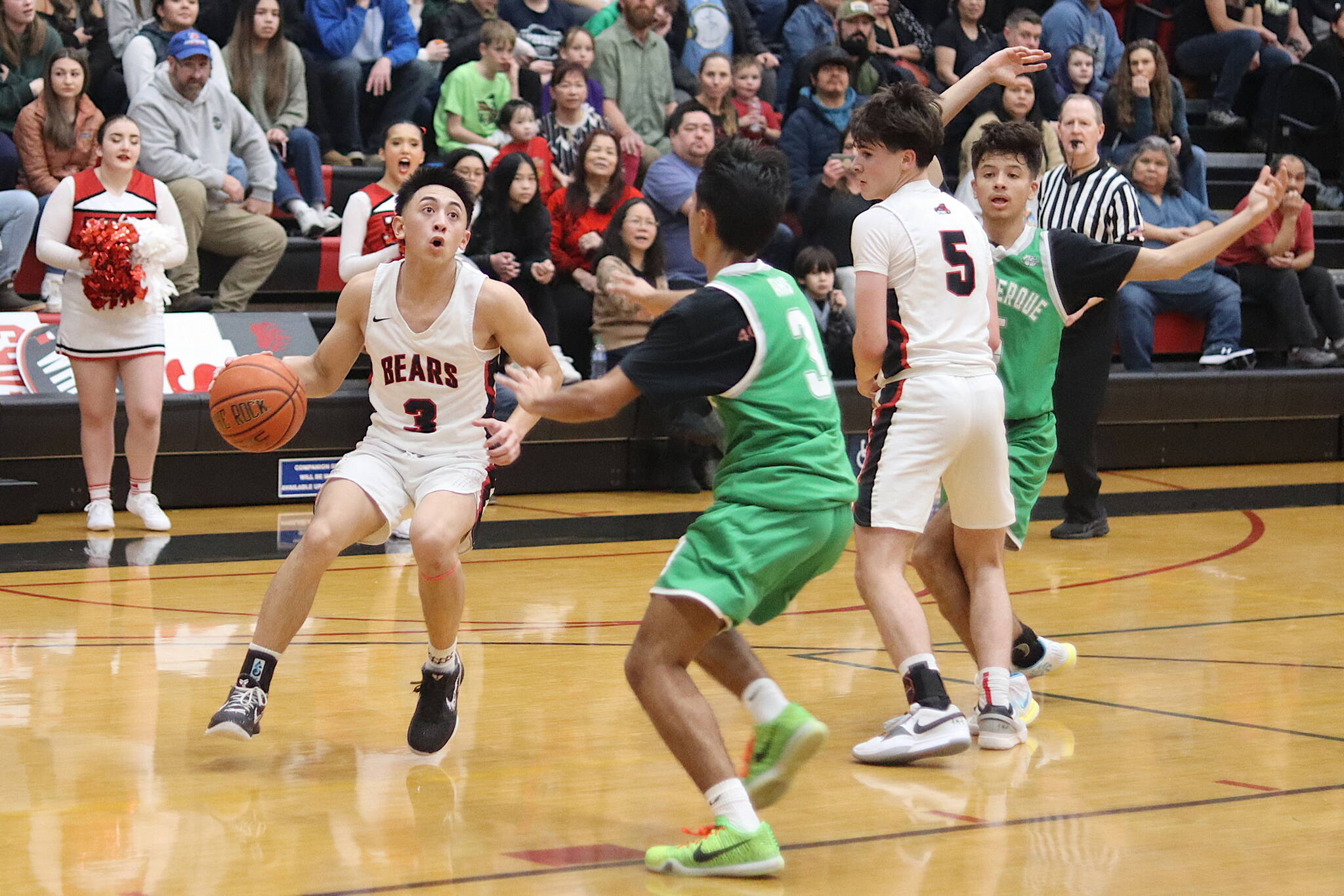 Juneau-Douglas High School: Yadaa.at Kalé guard Alwen Carrillo (#3) looks to drive inside against Albuquerque High School during the final game of the Capital City Classic at JDHS on Saturday night. (Mark Sabbatini / Juneau Empire)