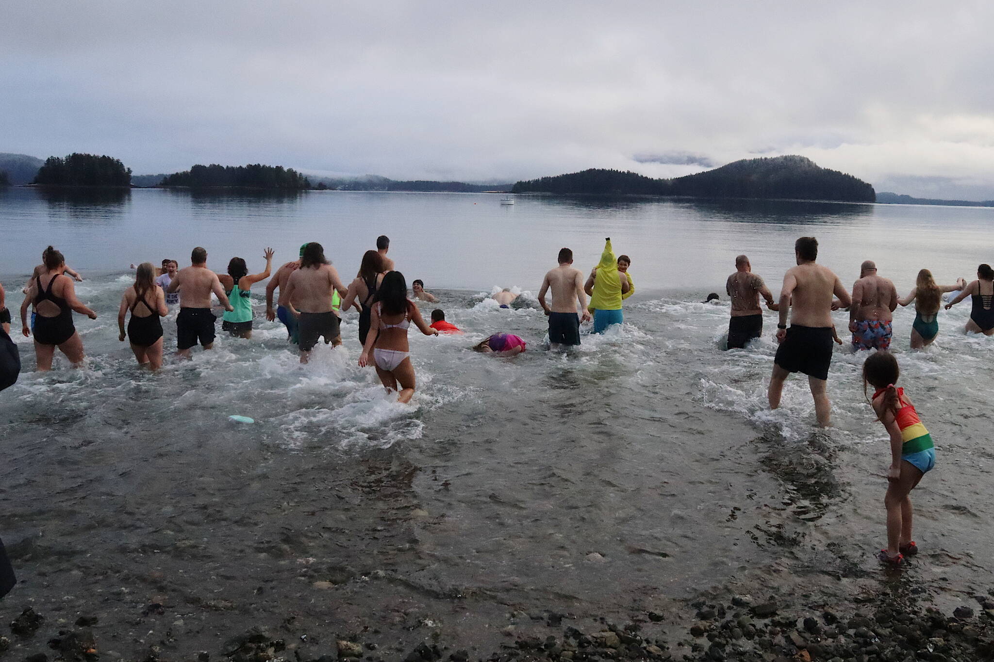 Hundreds wave goodbye to last year, plunge into 2024 during 33rd annual  Juneau Polar Bear Dip